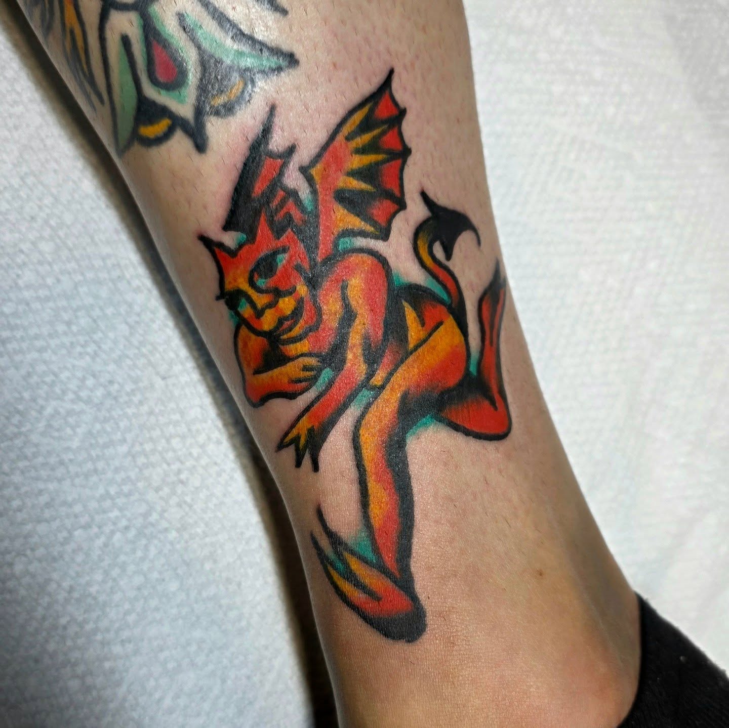 Demon American traditional tattoo on the forearm by Mitch Braver