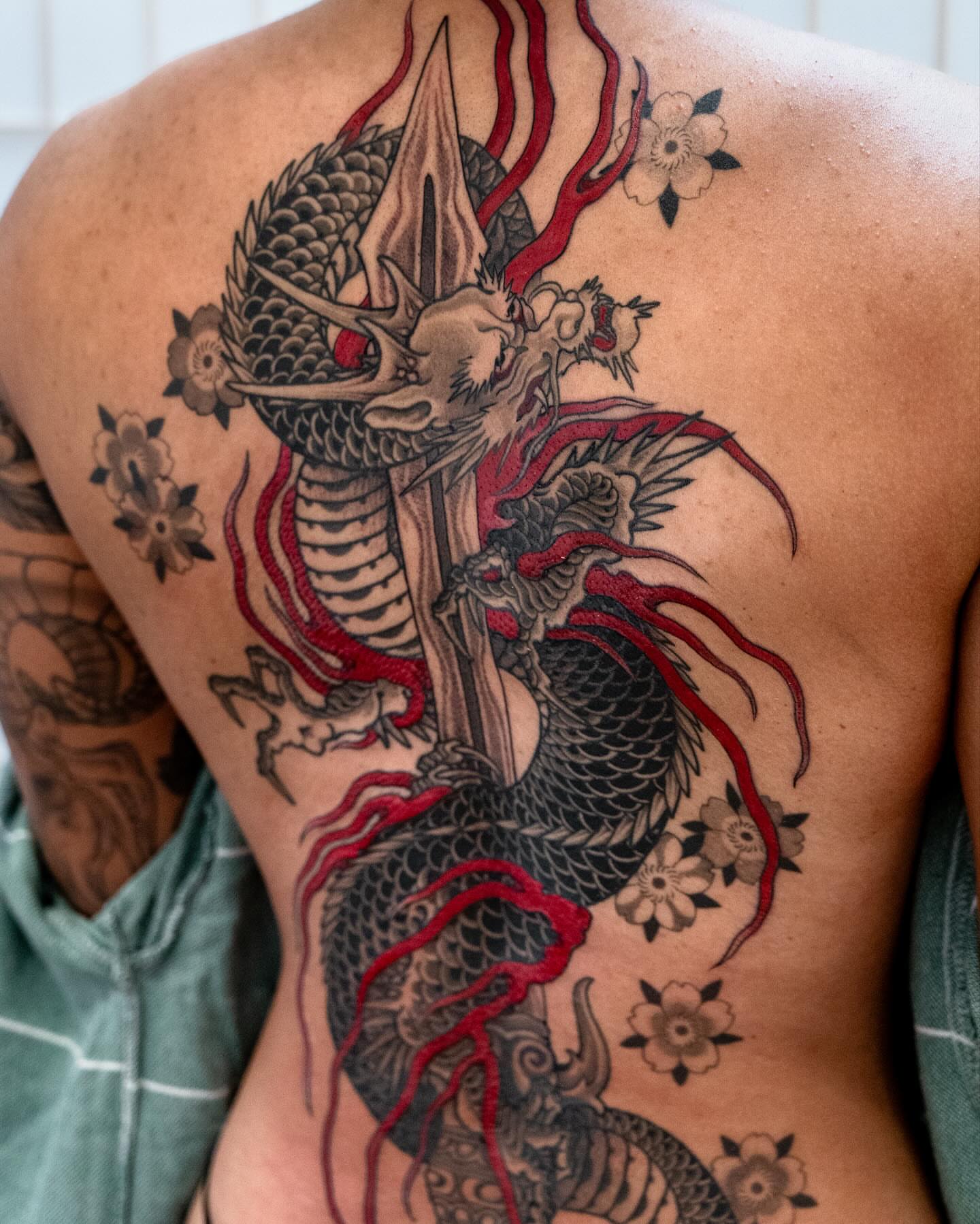 Dragon and flowers japanese irezumi tattoo on the back by Matt Leibo, San Francisco, California