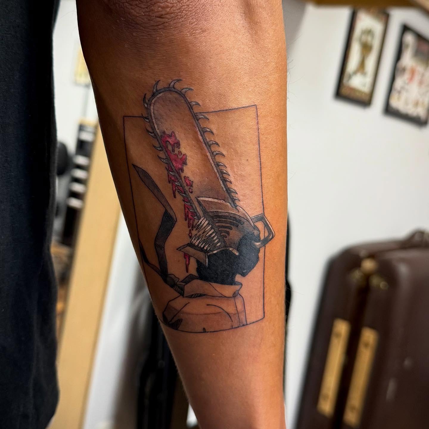 Chainsaw black and grey tattoo on the forearm by KT