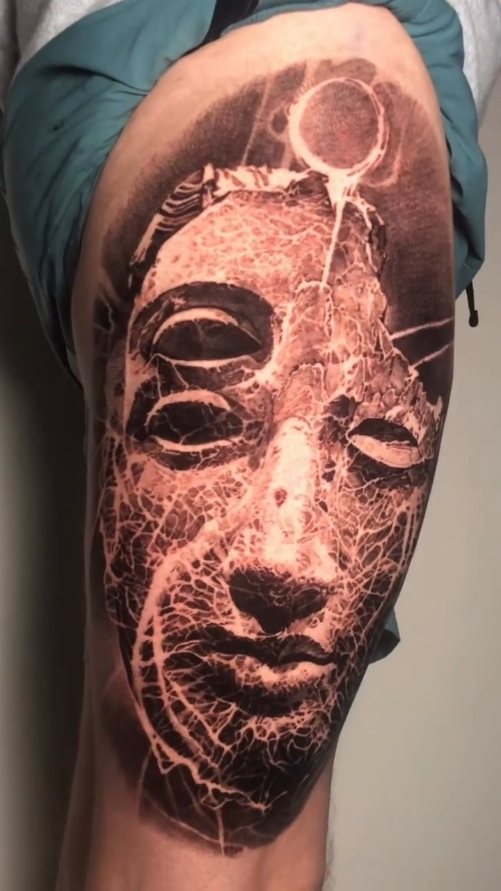 Tattoo by @robbylatos — dark_realism, black_and_grey