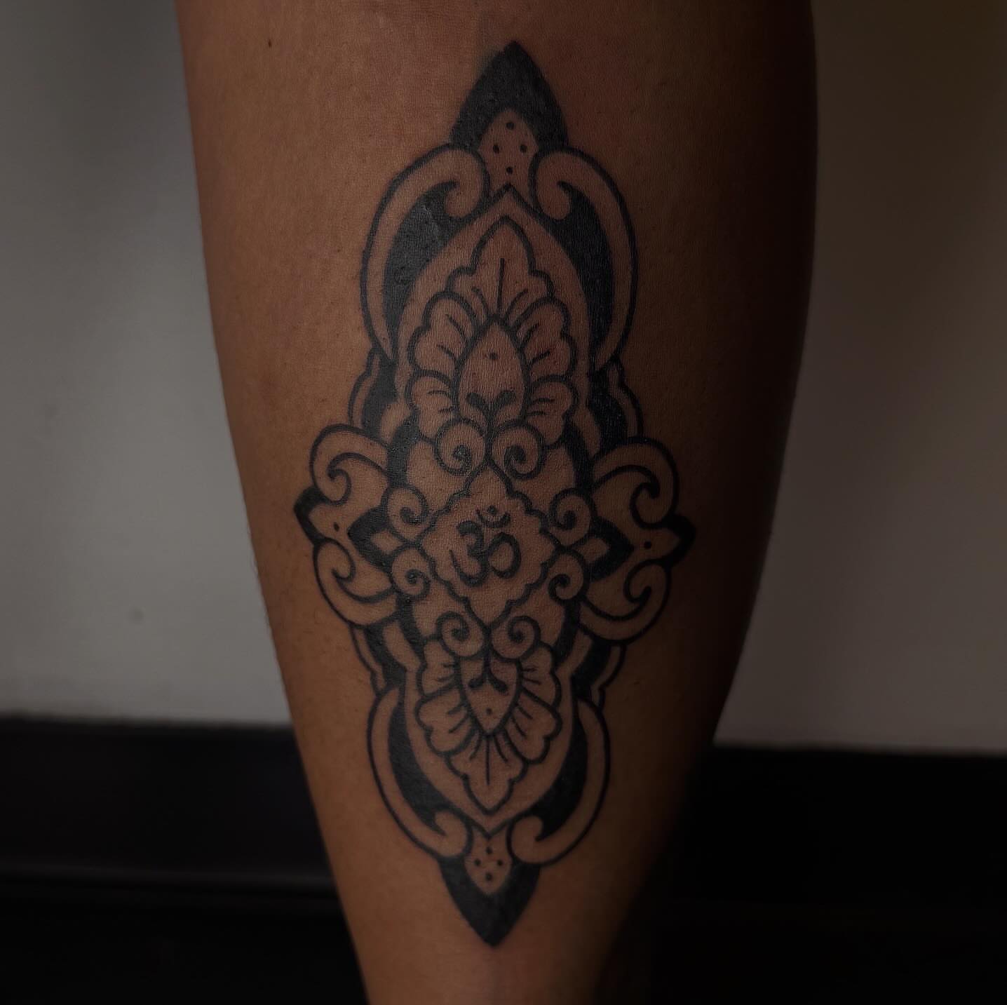 Ornamental design ornamental tattoo on the leg by Eden H., Columbus, Ohio