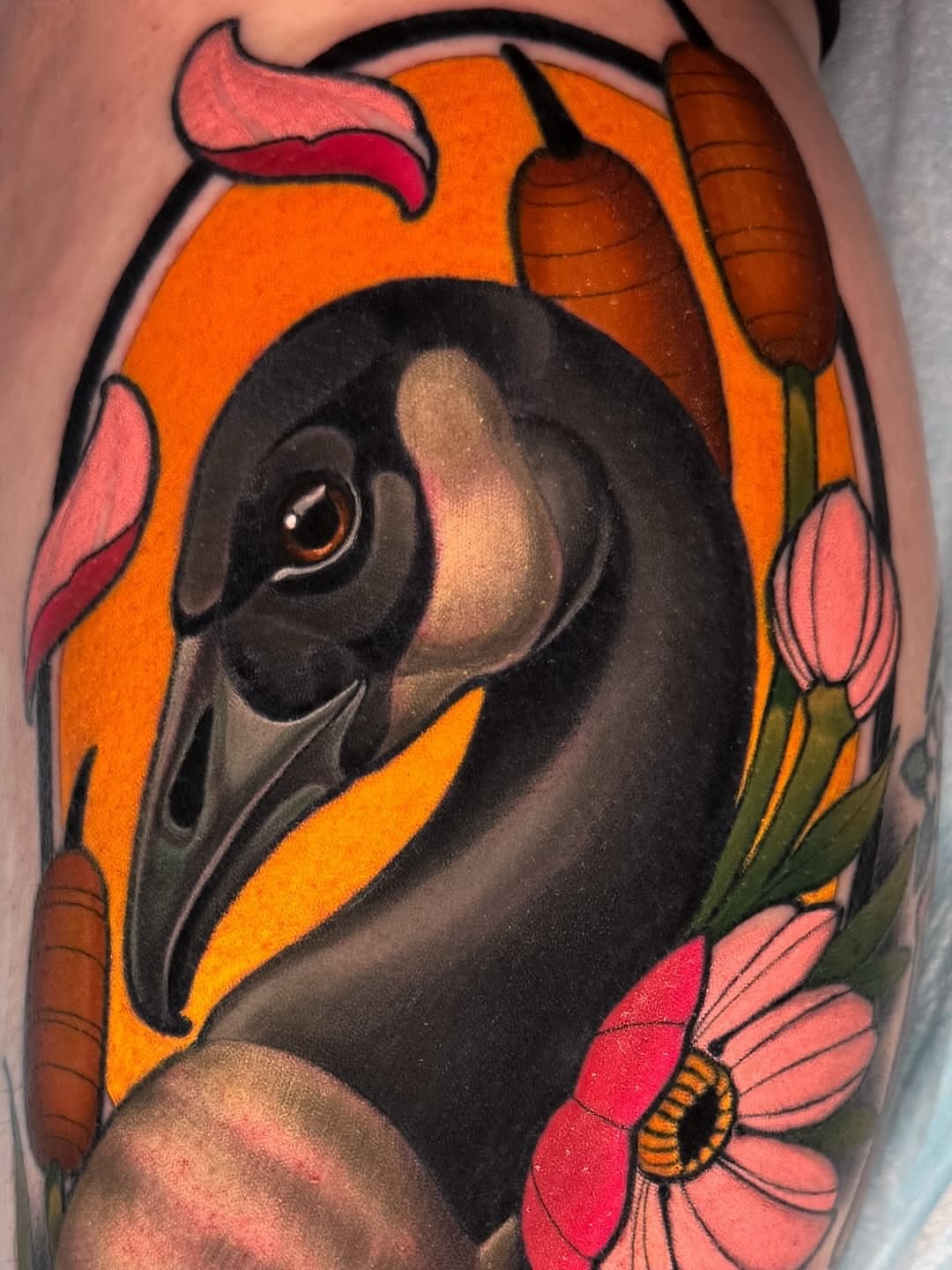 Swan and flowers American traditional tattoo on the forearm by Austin Britt
