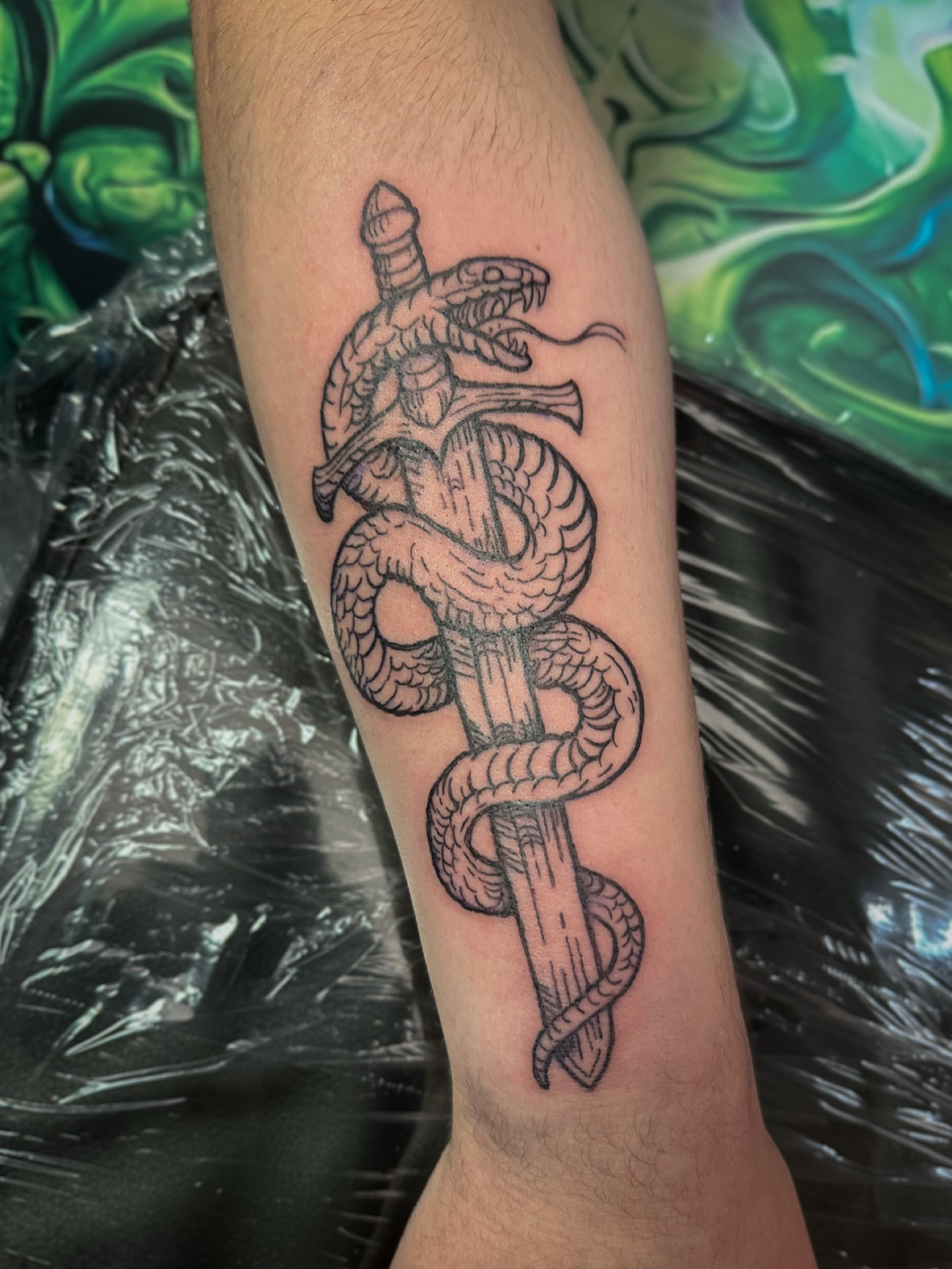 Caduceus black and grey tattoo on the forearm by π·πππ, Cleveland, Ohio
