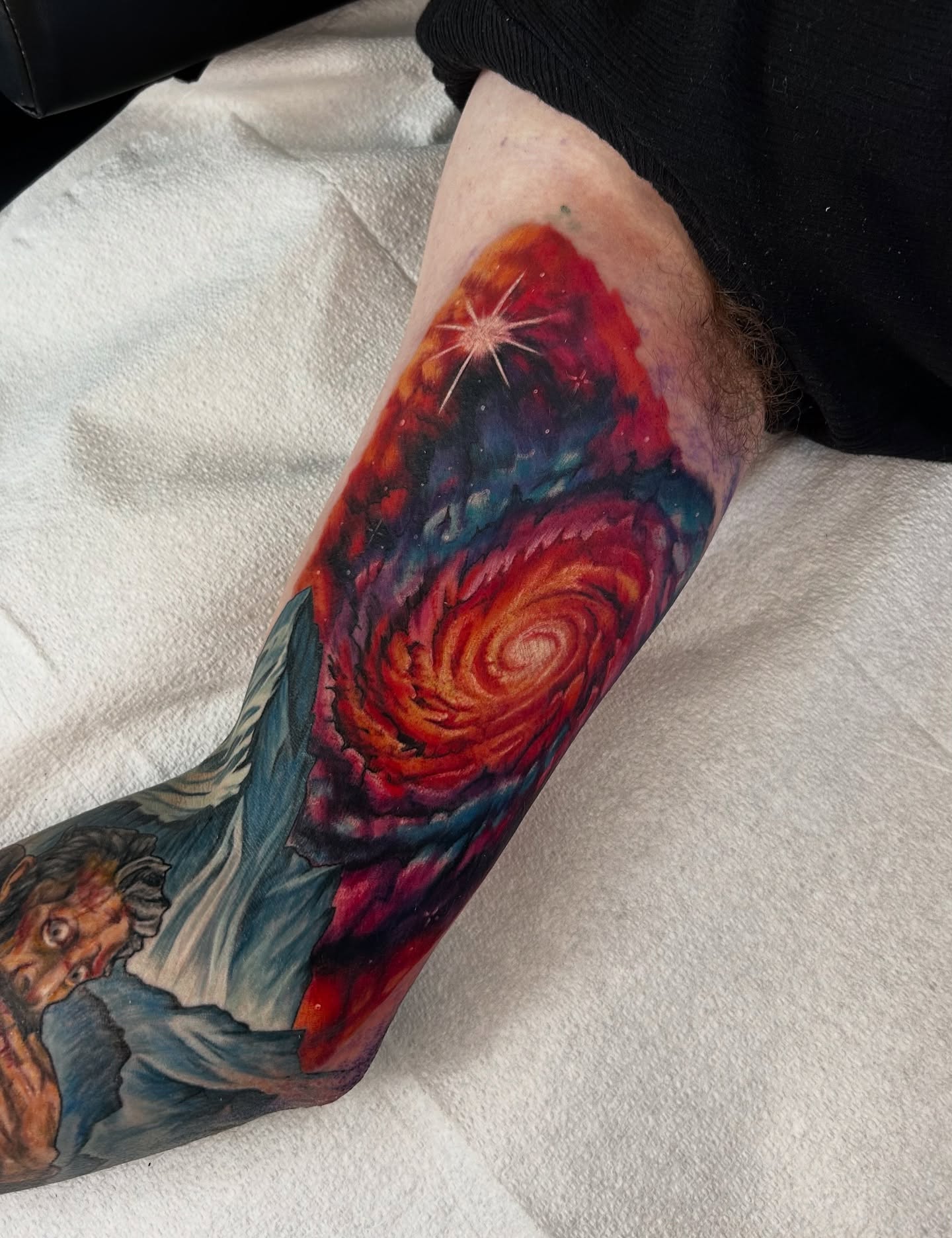 Galaxy watercolor tattoo on the forearm by Kim Goff - Special K