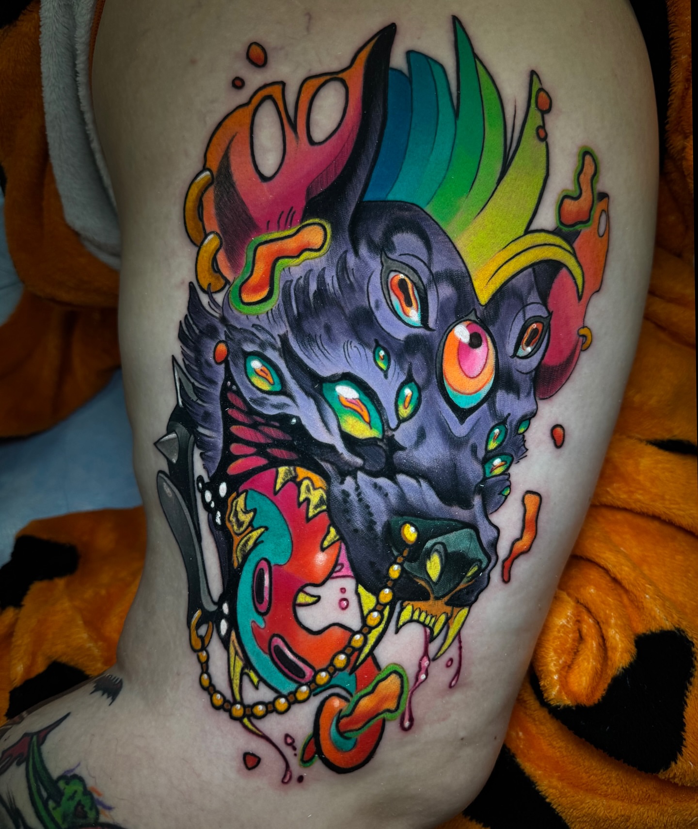 Abstract creature new school tattoo on the thigh by Kate Erso