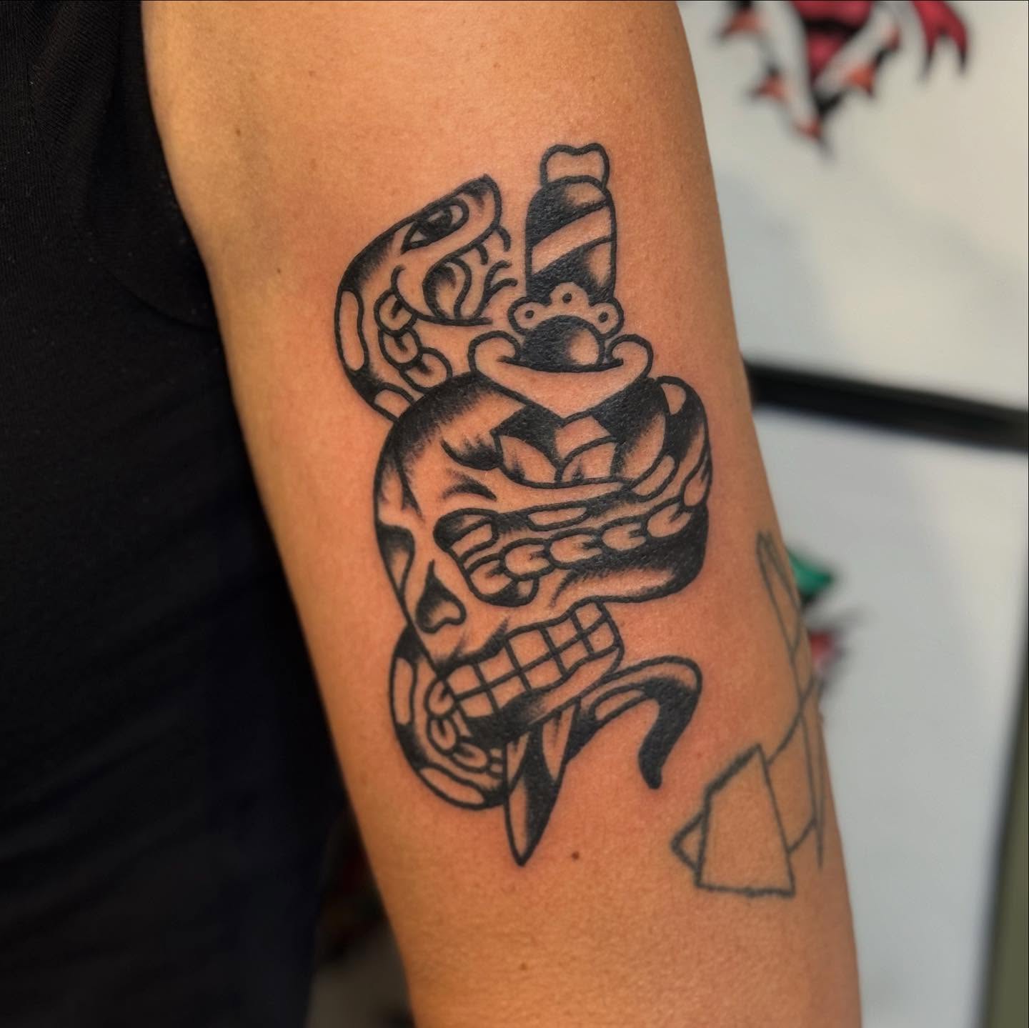 Tattoo by @rev.claytattooer — black_and_grey