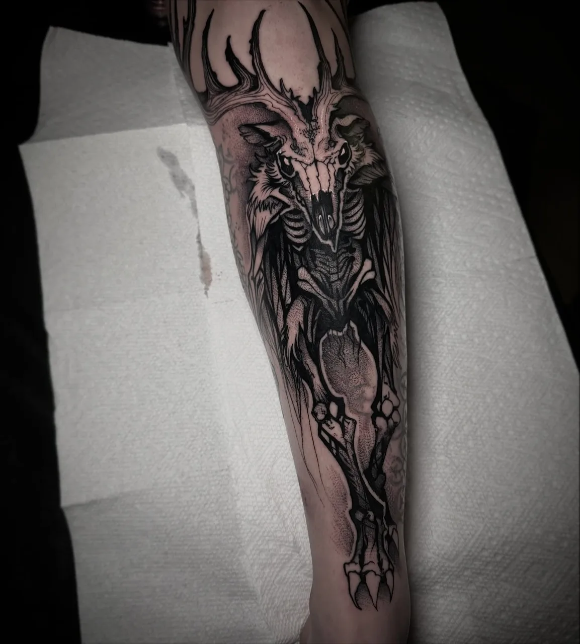 Demon dark realism tattoo on the forearm by David Mushaney