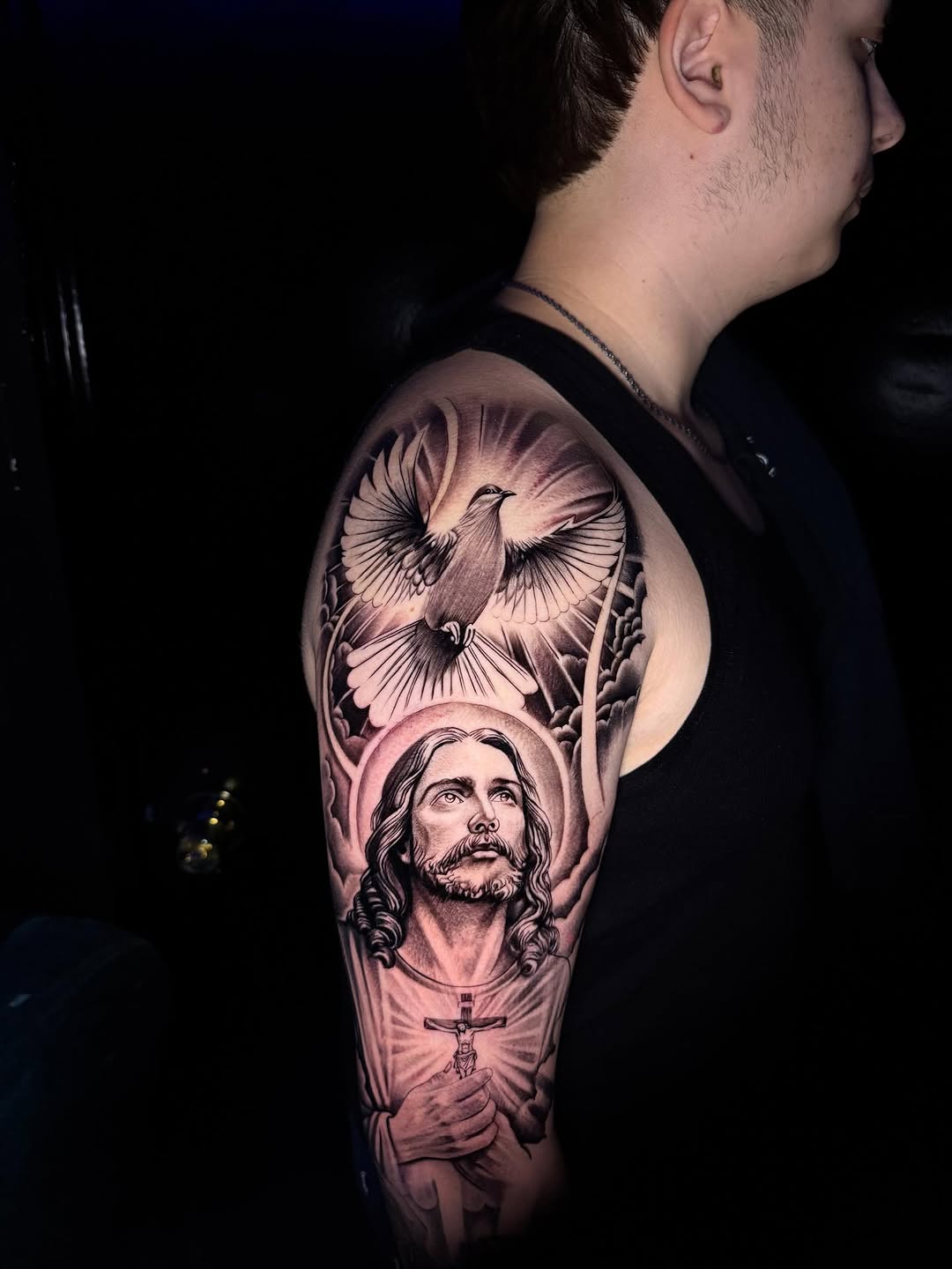 Tattoo by @tatts.x.hustler — realism, black_and_grey
