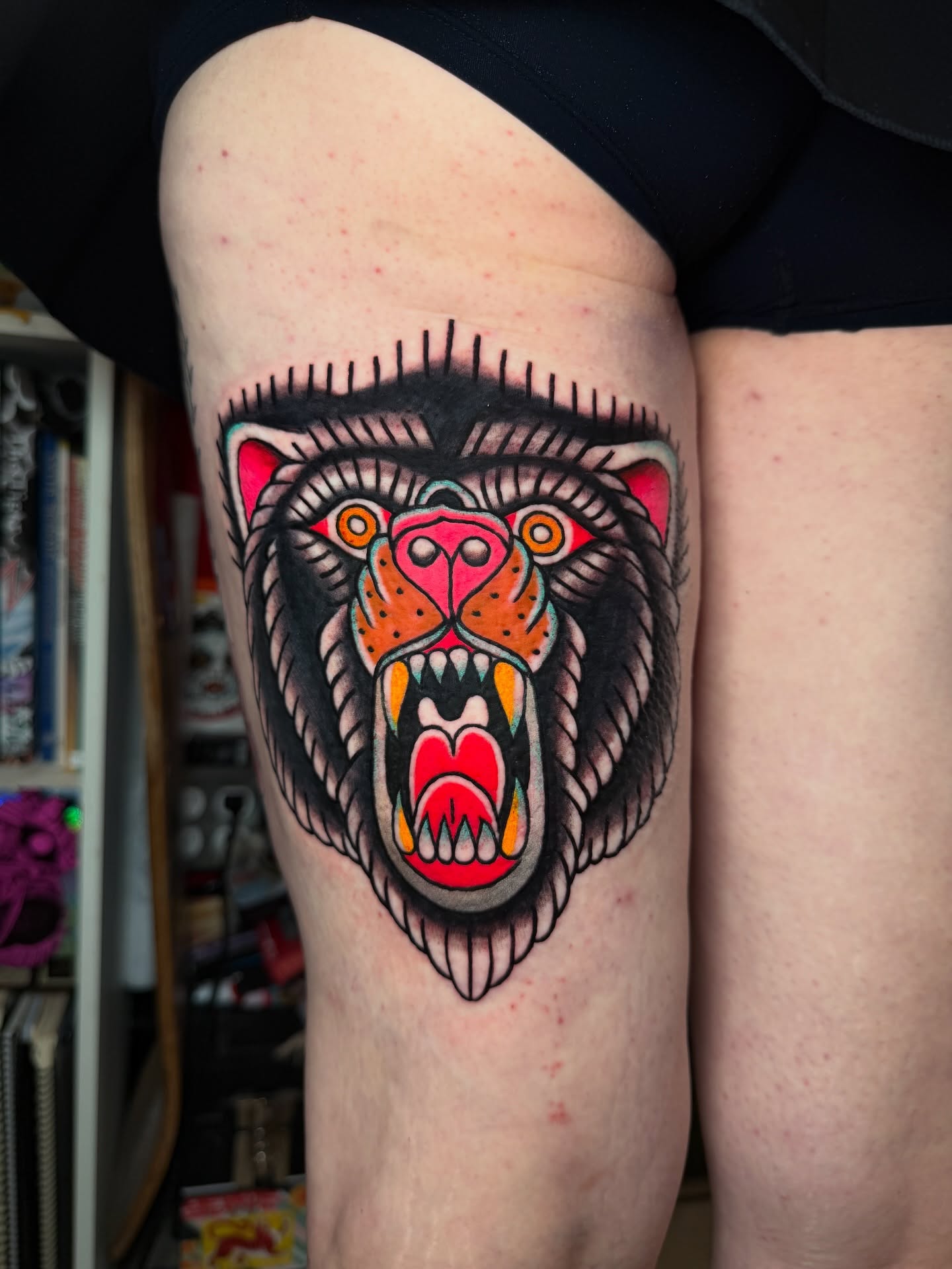 Roaring bear American traditional tattoo on the thigh by Tattoo Artist Los Angeles