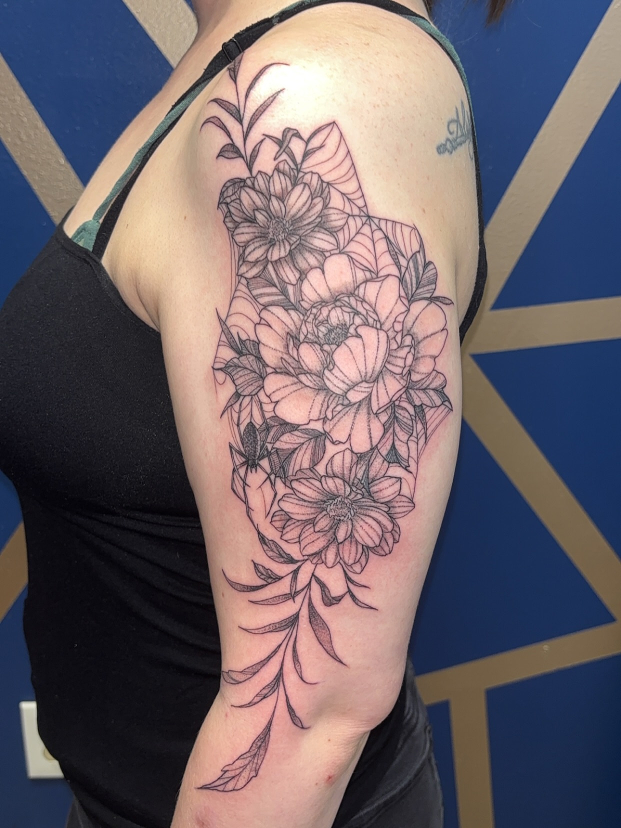 Floral bouquet black and grey tattoo on the forearm by ✨Cyerra Lynne✨