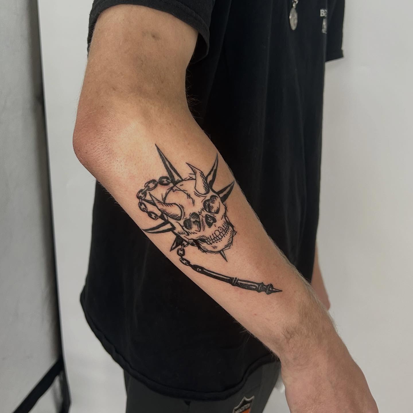 Skull with trident realism tattoo on the forearm by Lip™