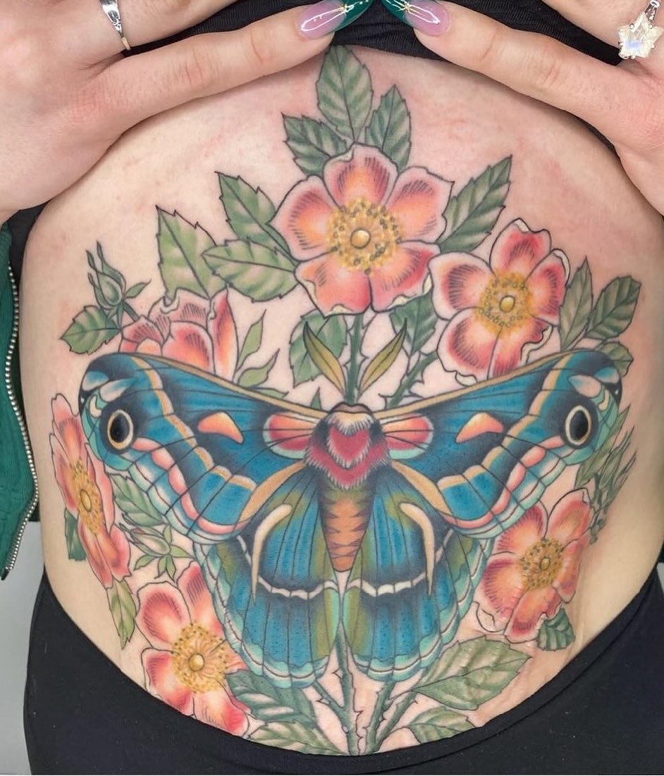Butterfly and flowers American traditional tattoo on the torso by Vivian HavaTattoo, Richmond, Virginia
