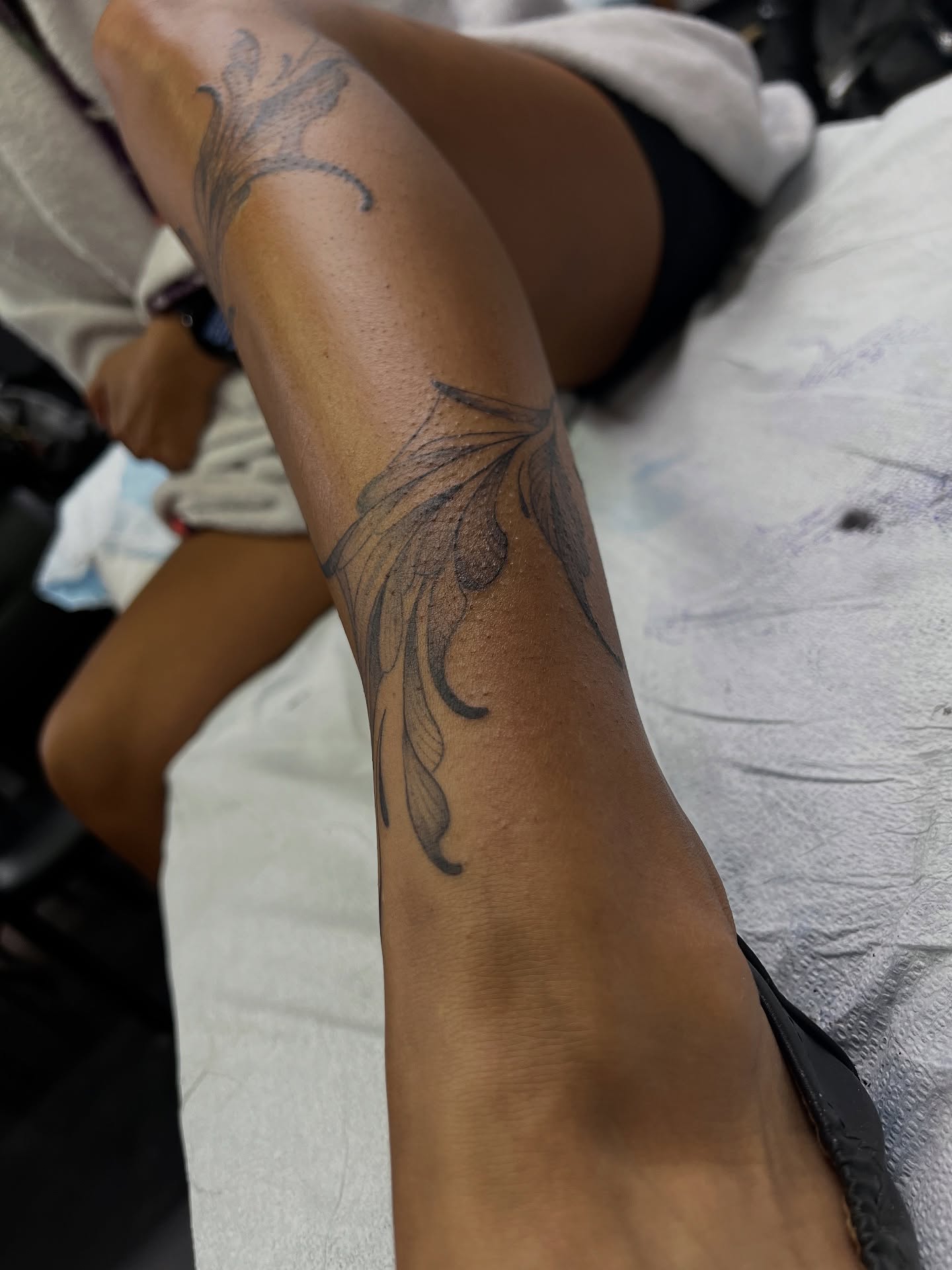 Flower black and grey tattoo on the forearm by Daphne Landry