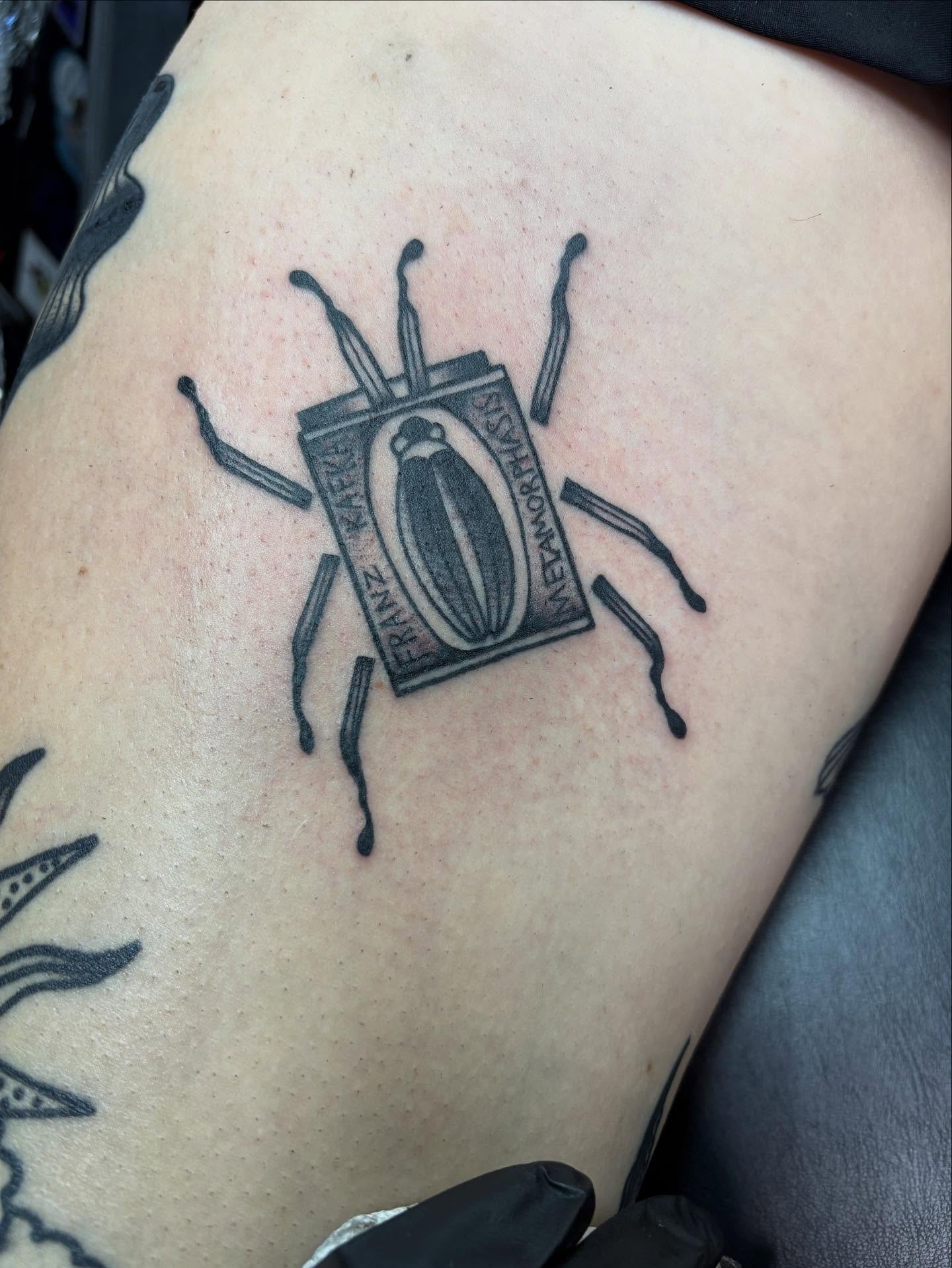 Beetle black and grey tattoo on the thigh by ✨Shelby ✨