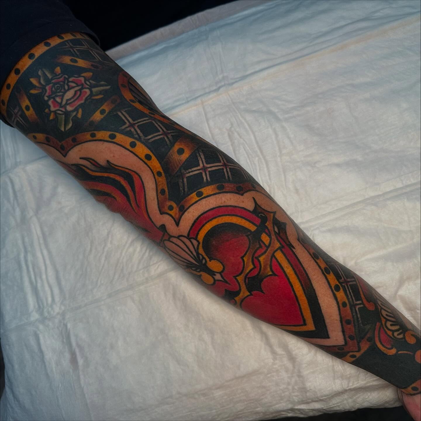 Heart and floral motifs American traditional tattoo on the forearm by Jenni Hand - Tattoo, Maryville, Tennessee