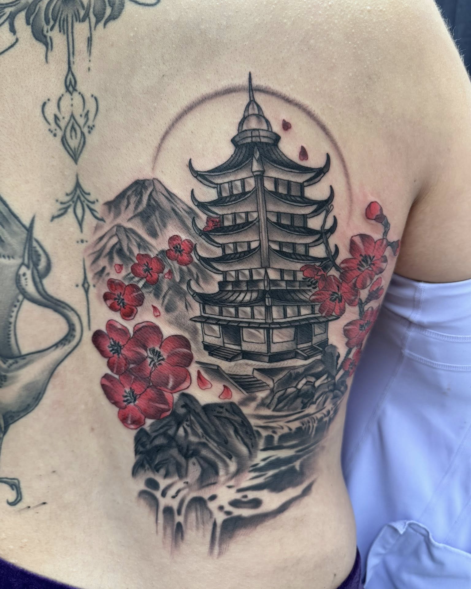 Cherry blossoms and pagoda japanese irezumi tattoo by Murbee