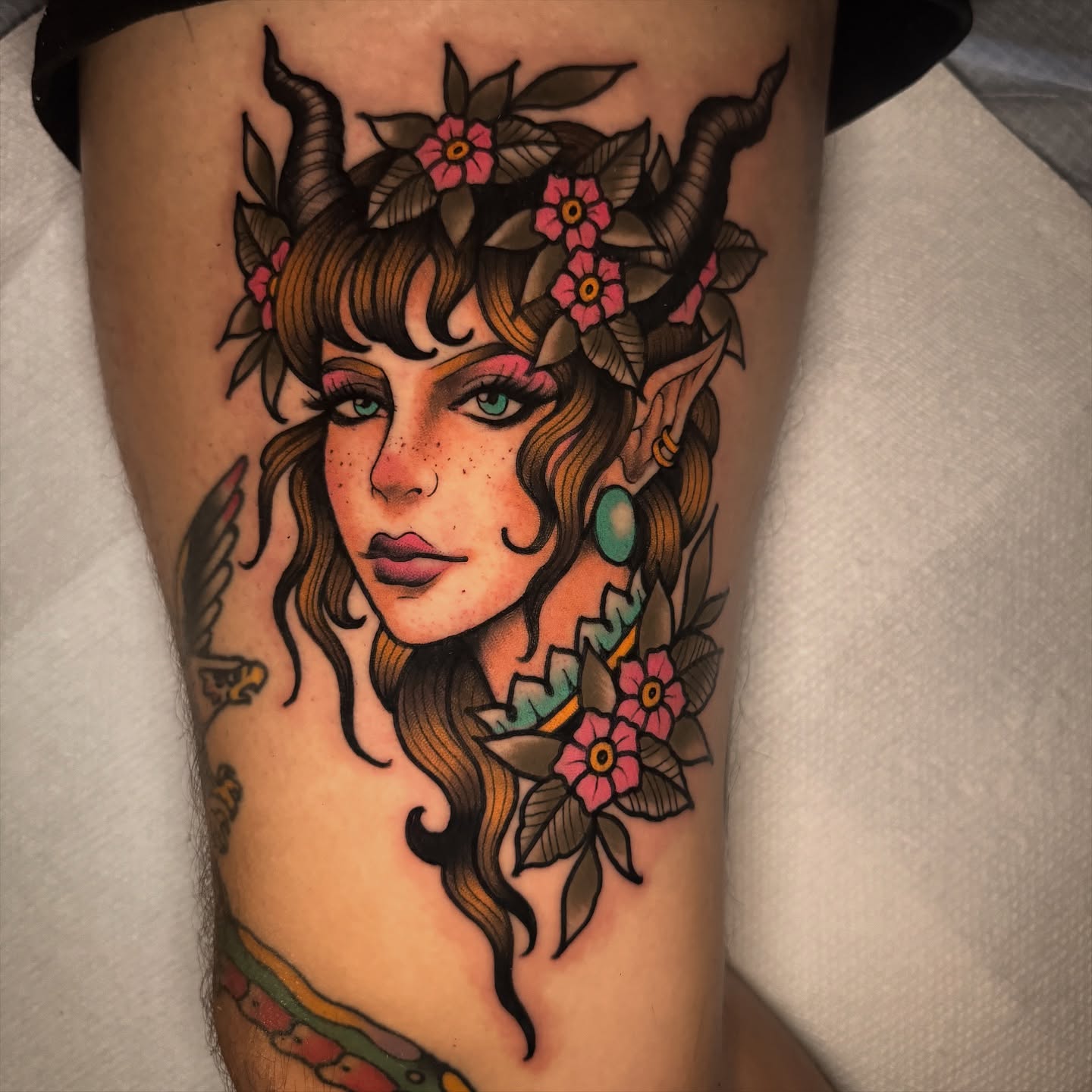 Female fantasy creature American traditional tattoo on the thigh by K y l e   M a c K e n z i e, Salem, Massachusetts