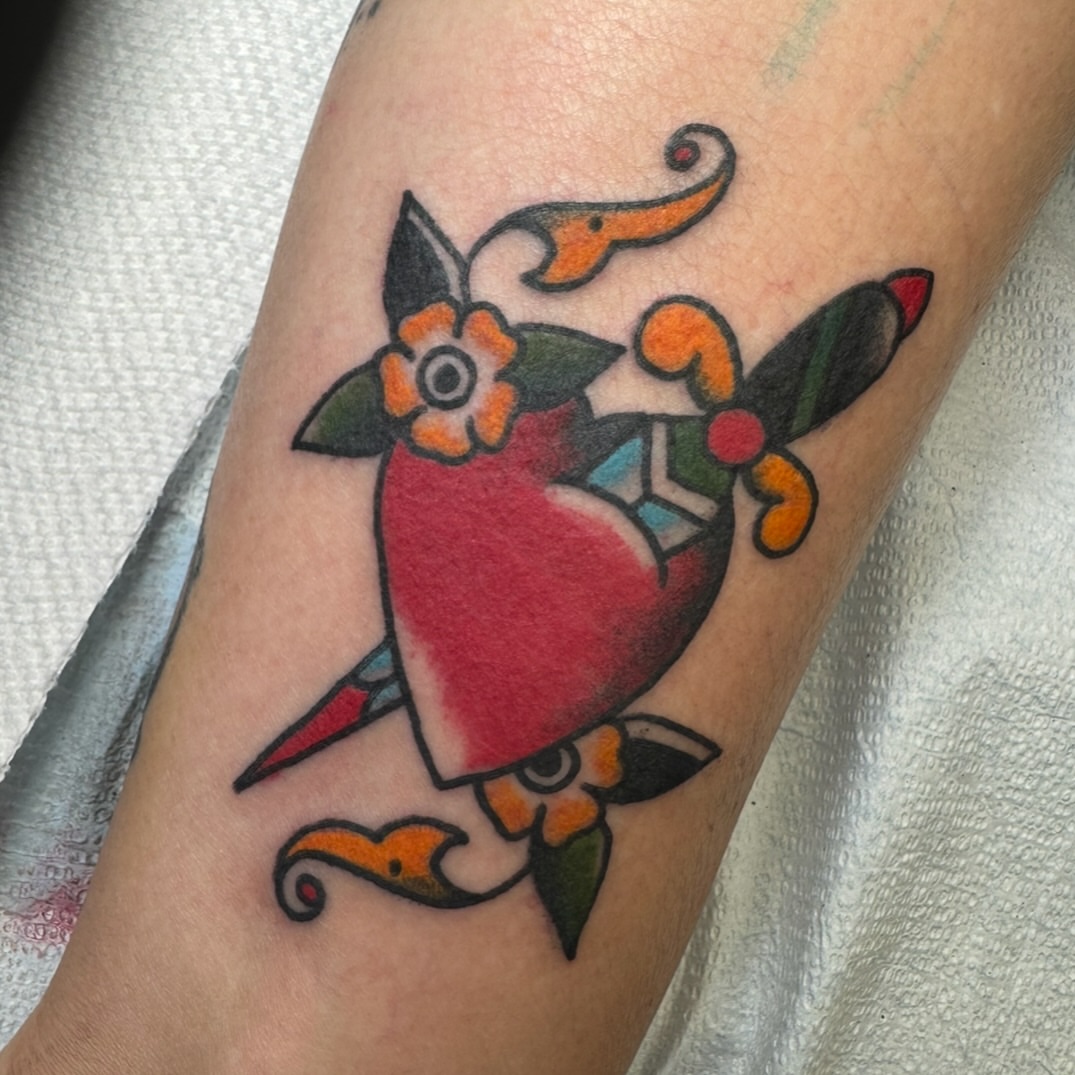 Parrot American traditional tattoo on the forearm by Michael Roehrich (MEECH!)