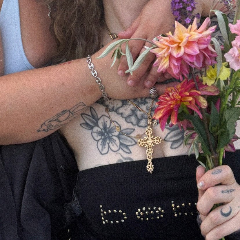 Floral black and grey tattoo on the torso by Tabby Wirebach, Kutztown, Pennsylvania