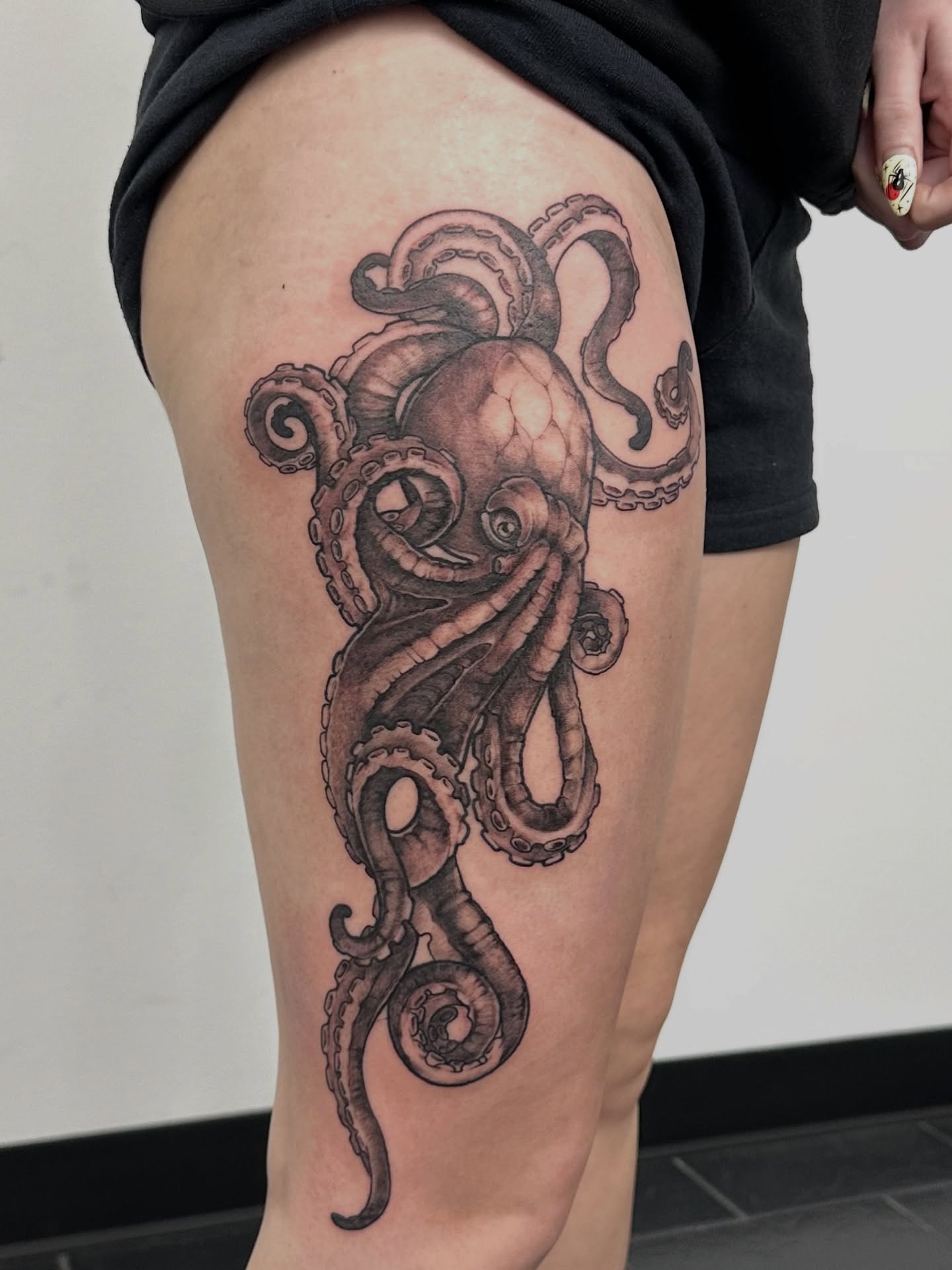Octopus black and grey tattoo on the thigh by ๐ฌ๐๐๐ฏ๐ ๐ฆ ๐๐ฉ๐ฆ๐ท๐๐๐ข๐ฑ๐ฅ ๐ซง๐ผ, Joplin, Missouri