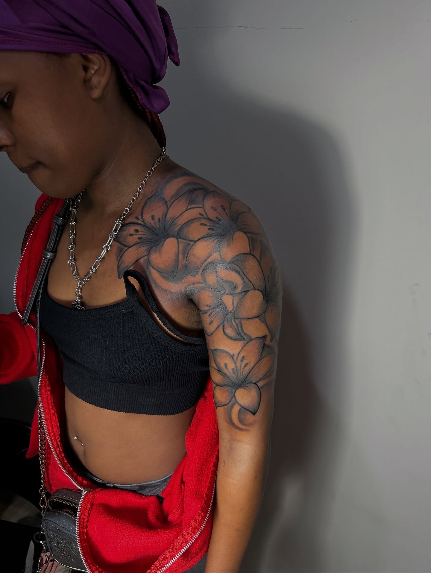 Floral black and grey tattoo on the shoulder by nylachanel
