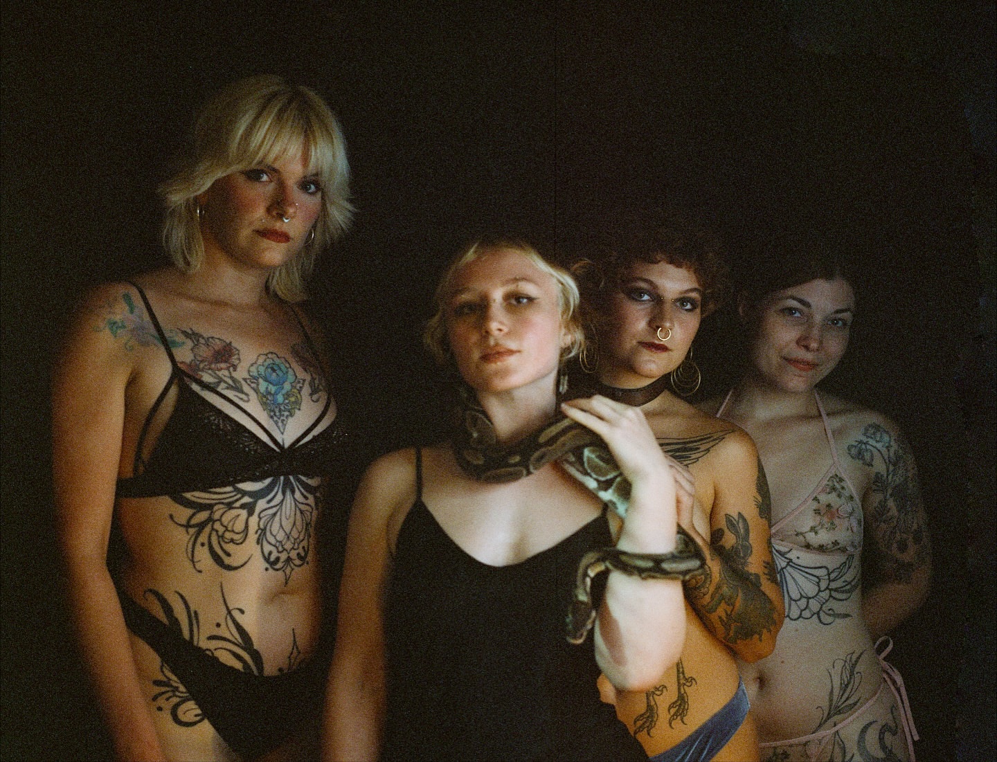 Tattooed women black and grey tattoo on the torso by Summer Shield