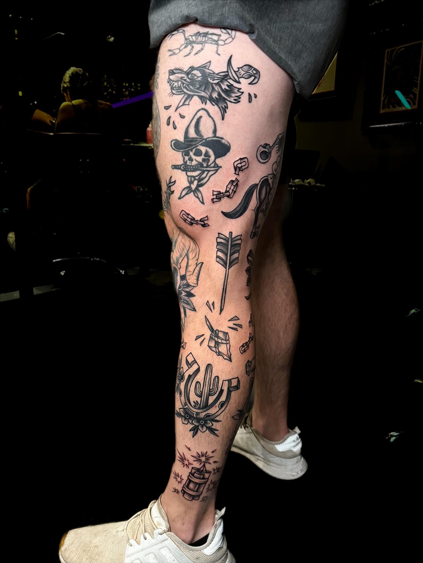 Cowboy skull with sombrero American traditional tattoo on the calf by Demi DiMartino