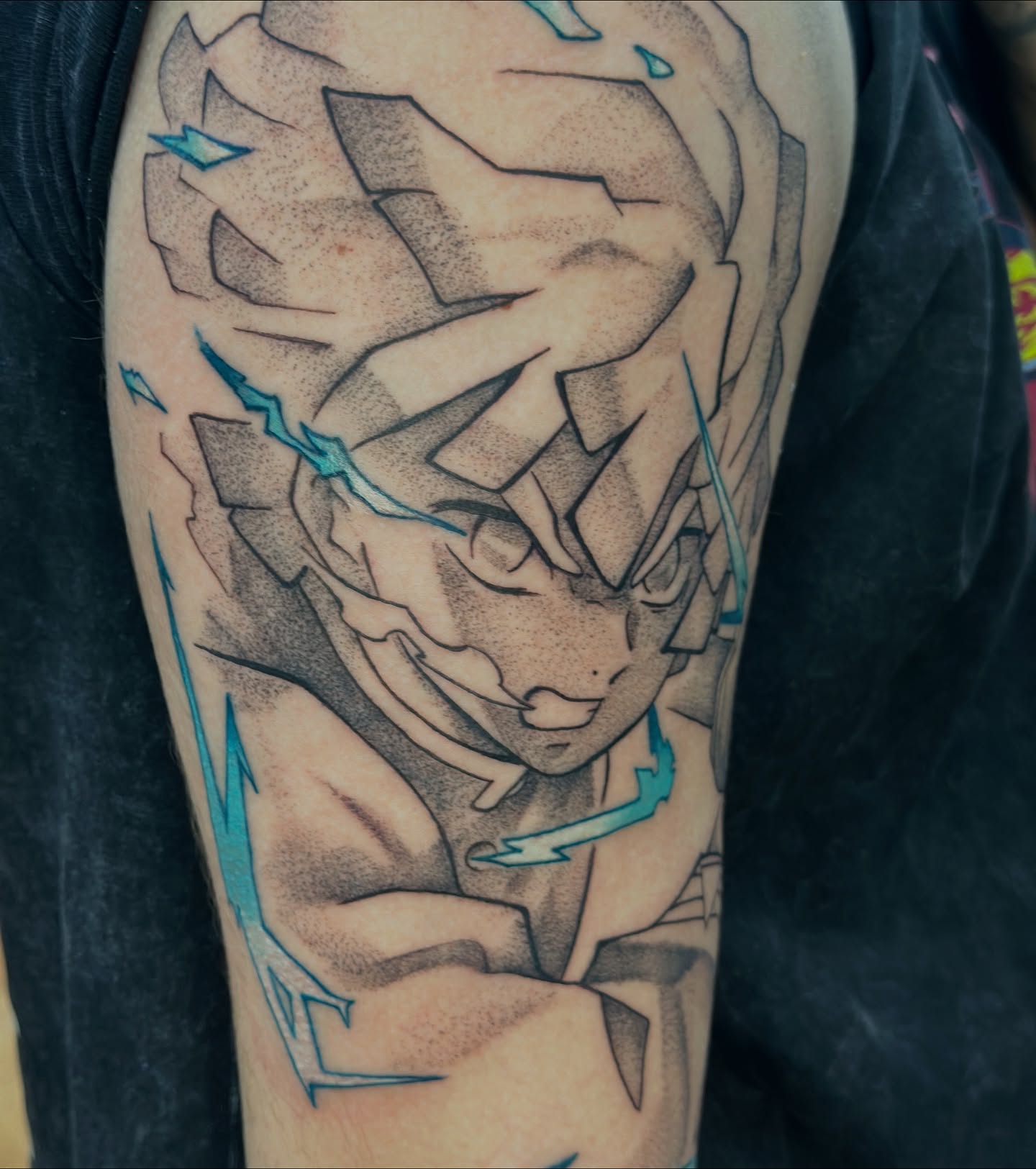 Anime character anime tattoo on the forearm by Trent Hebert