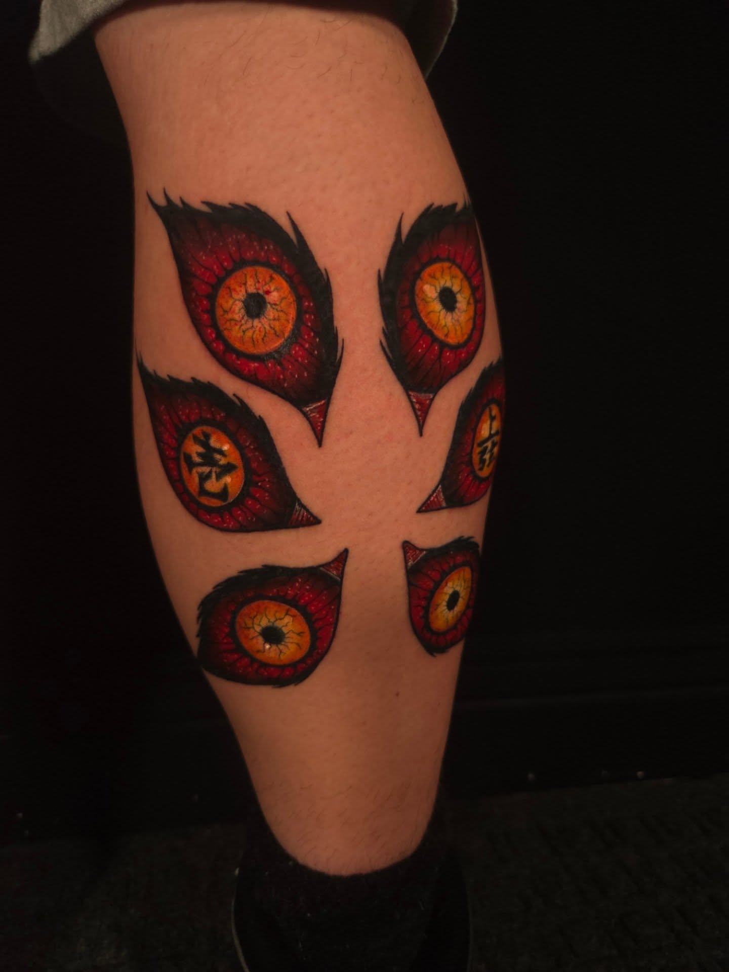 Eyes dotwork tattoo on the thigh by Devan Vankirk