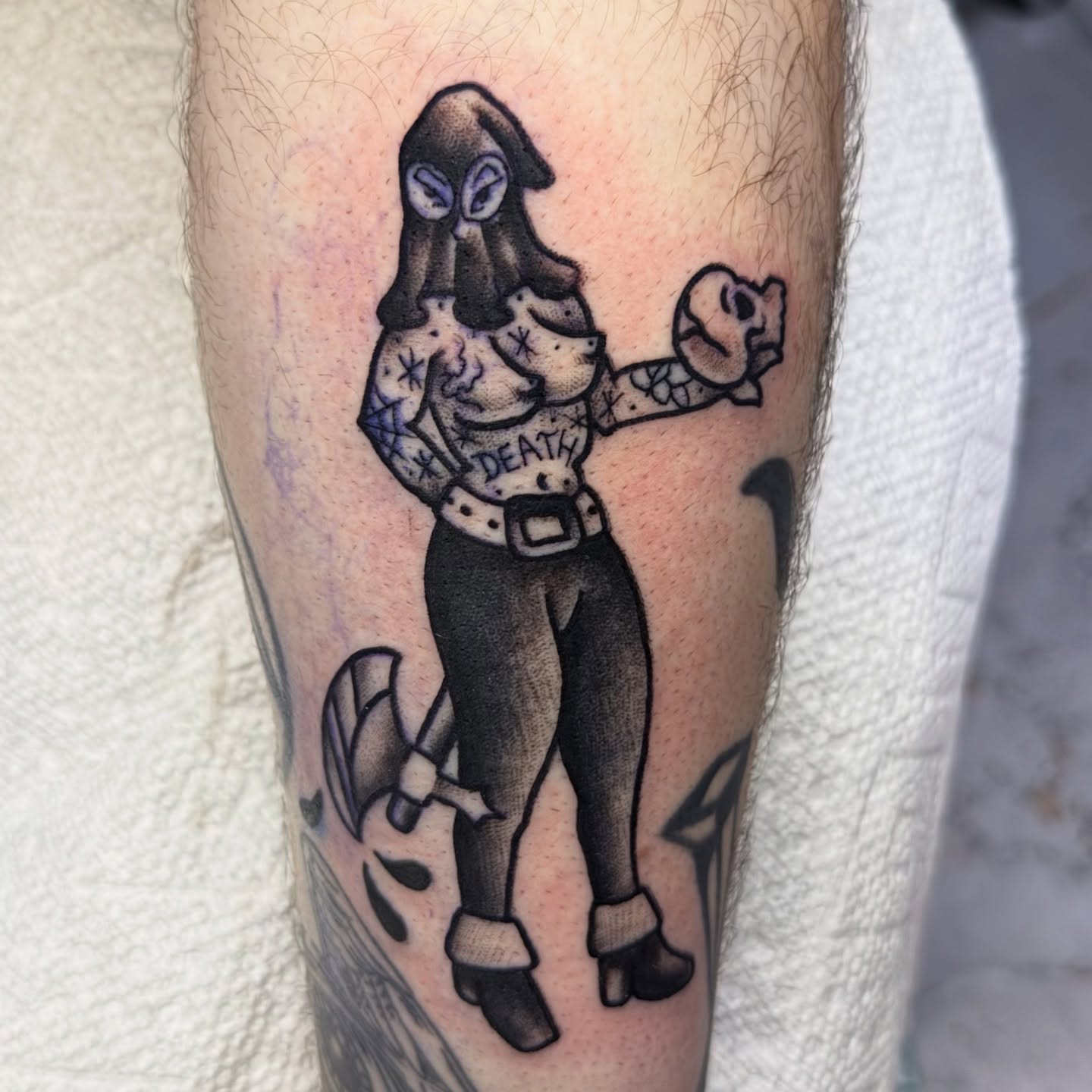 Female figure with skull black and grey tattoo on the forearm by Ash Nicola, Asheville, North Carolina