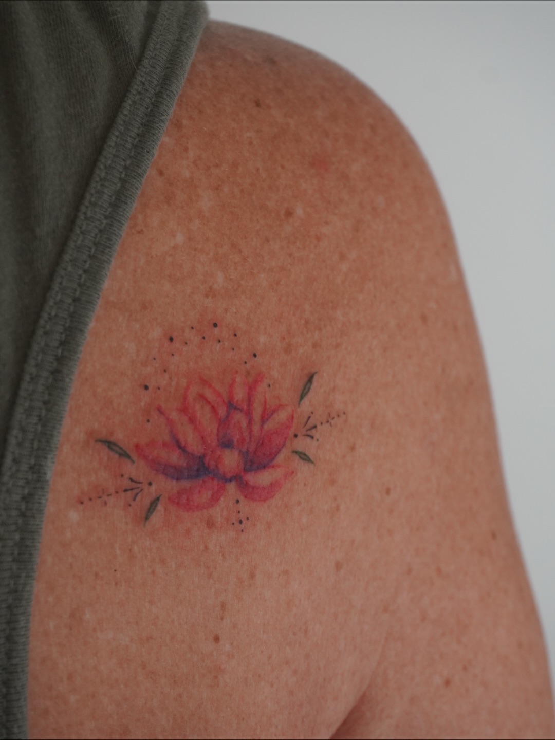 Lotus flower dotwork tattoo on the shoulder by Sun Child Tattoo 🌻