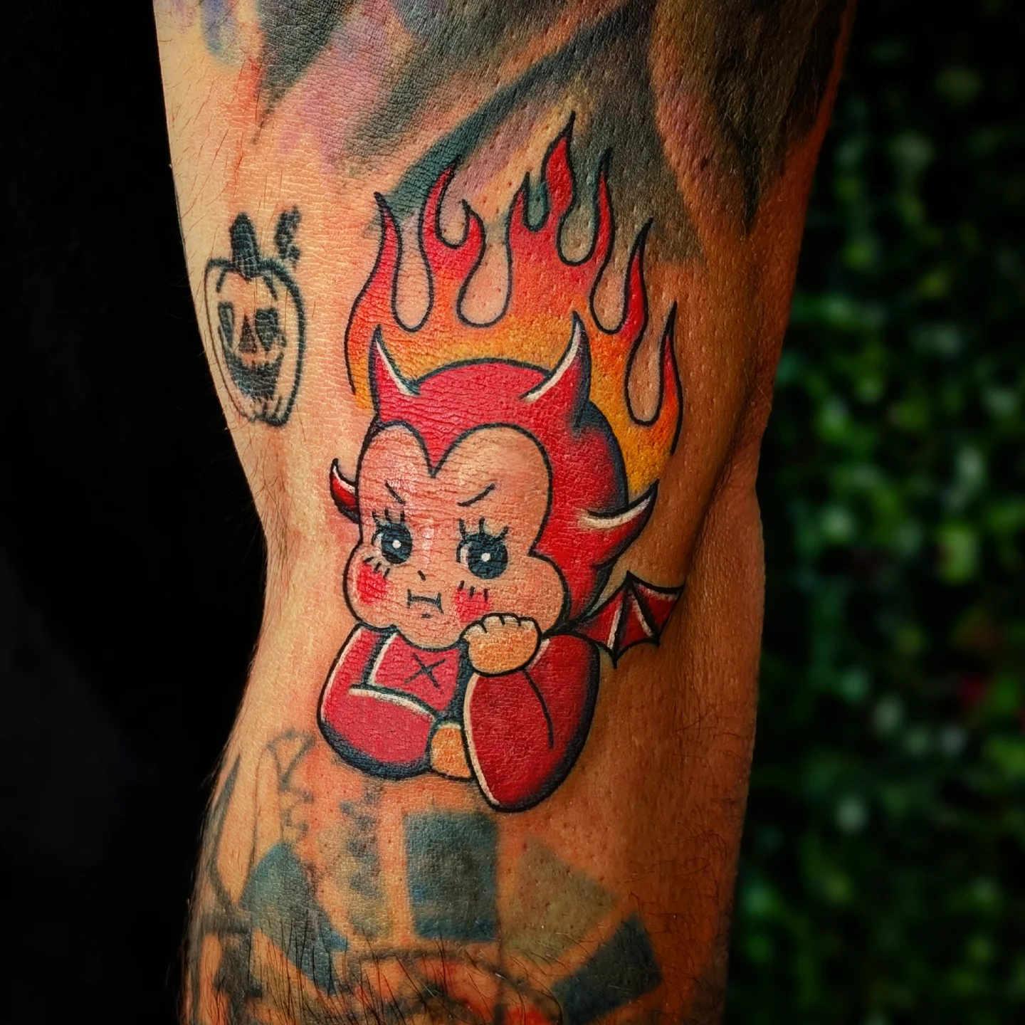 Devil character American traditional tattoo on the forearm by Marlayna Connelly