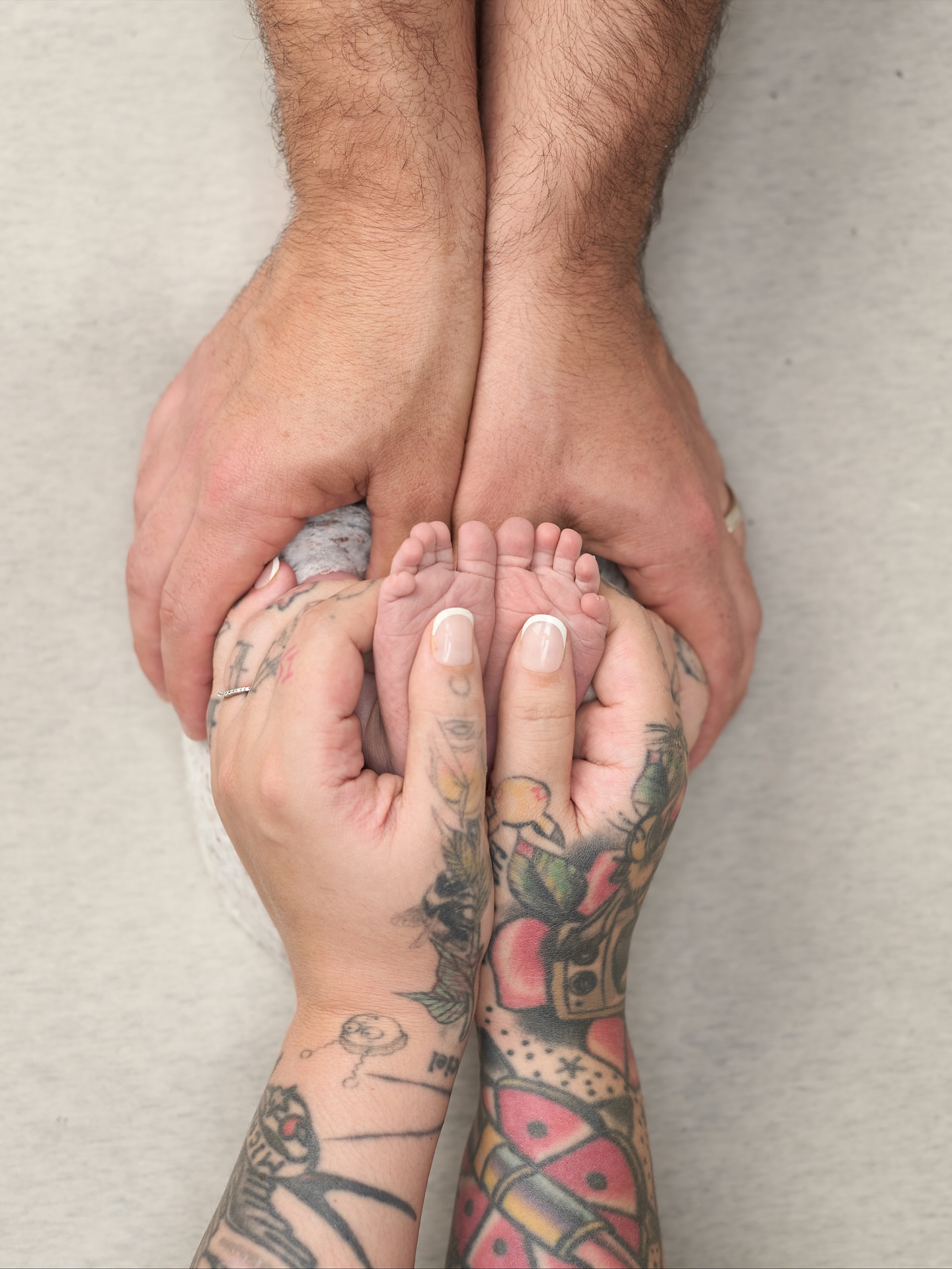 Baby feet American traditional tattoo on the hand by sam cedar geller 🐝