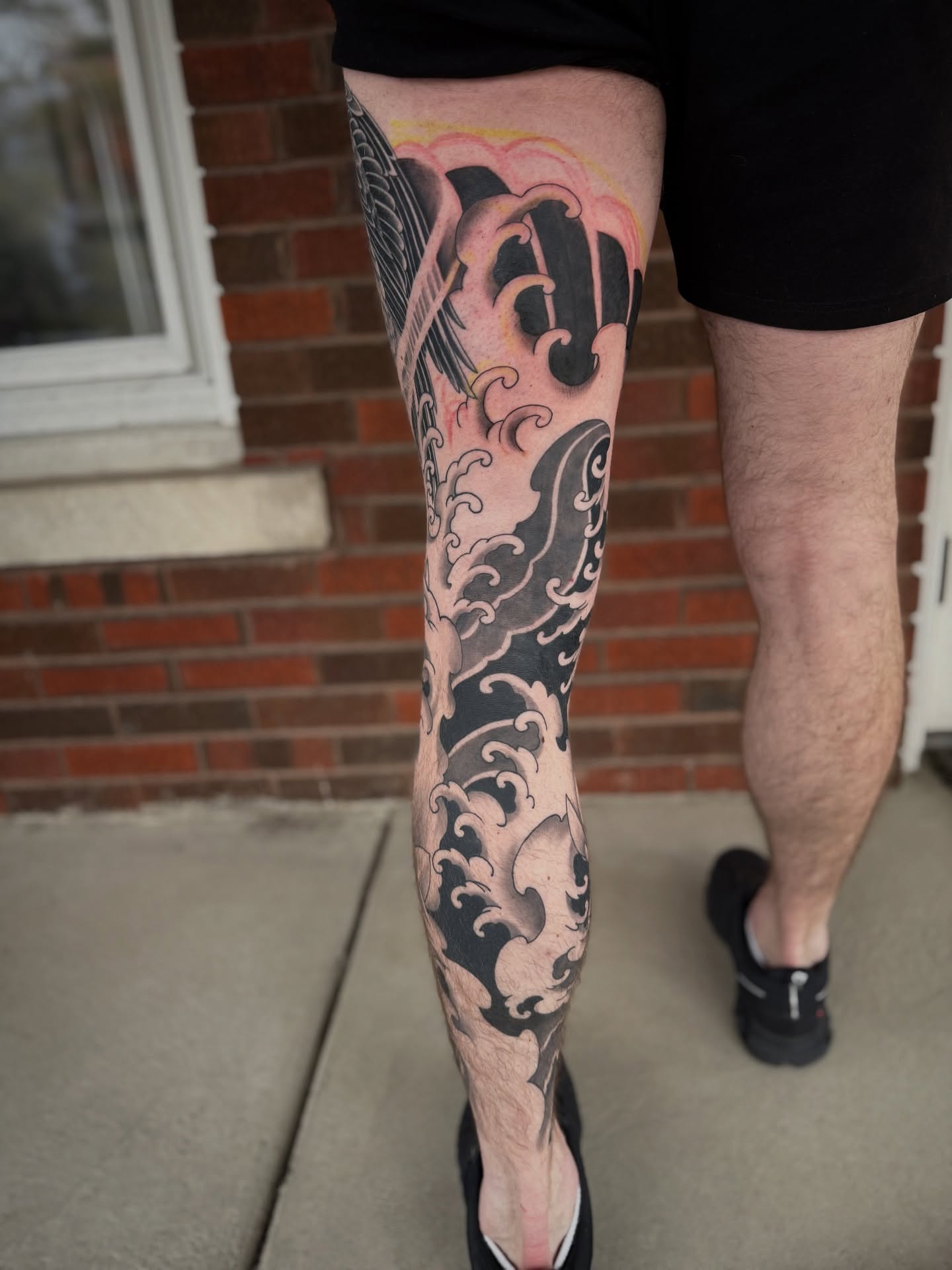 Waves japanese irezumi tattoo on the calf by Jeremy Utley