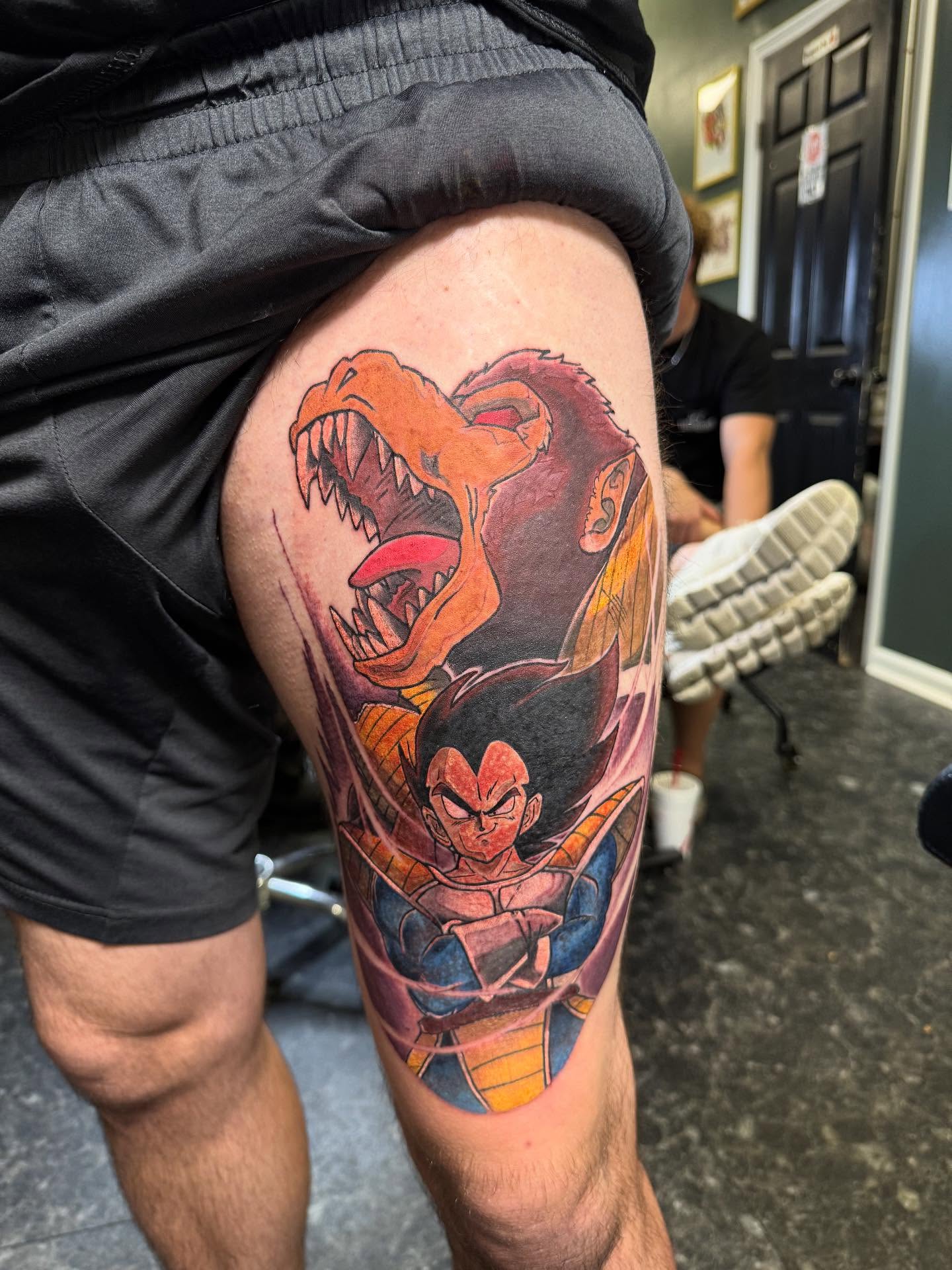 Vegeta and dragon anime tattoo on the thigh by Kodi Green