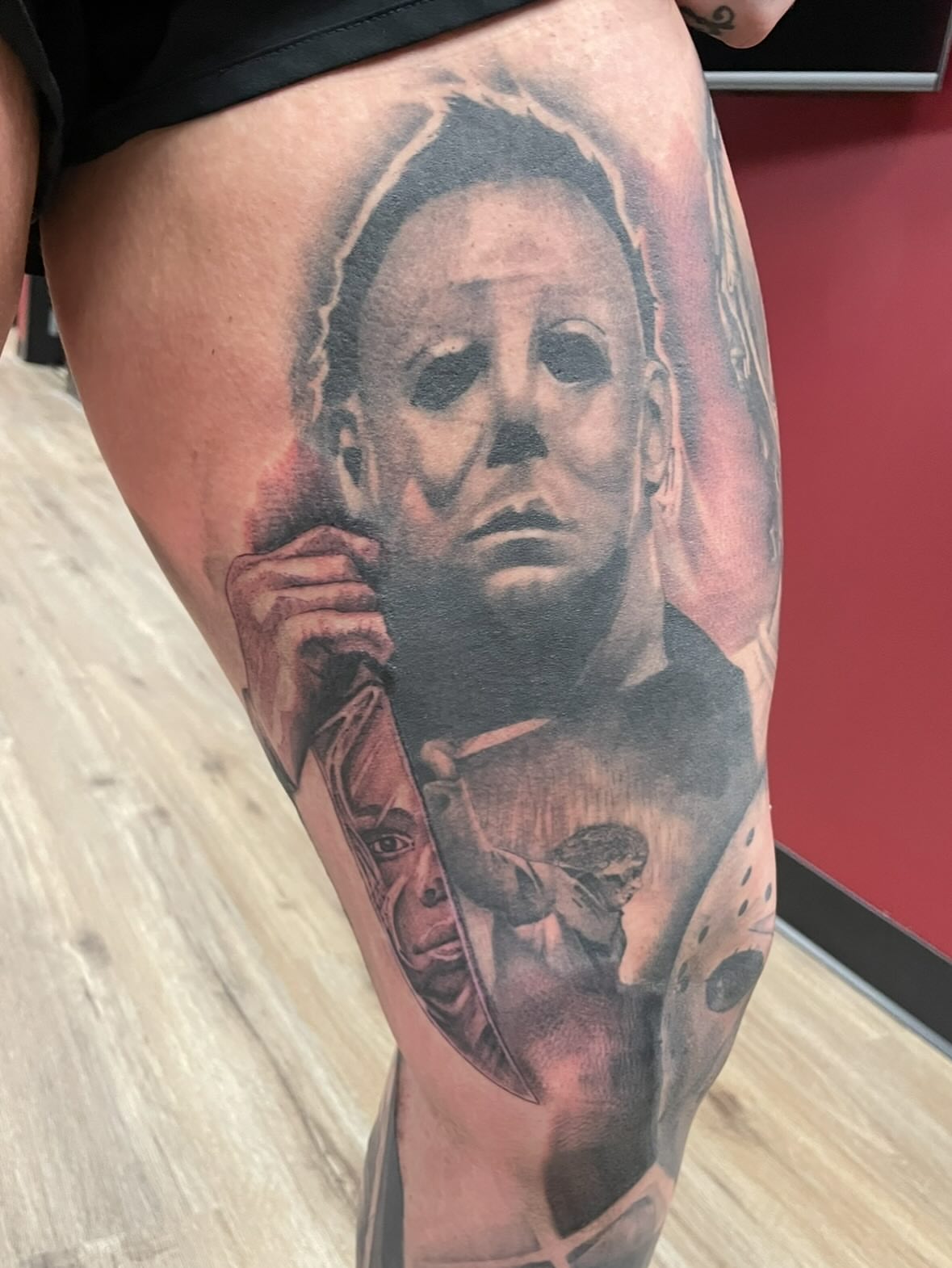 Michael Myers realism tattoo on the thigh by Robbie Bryant