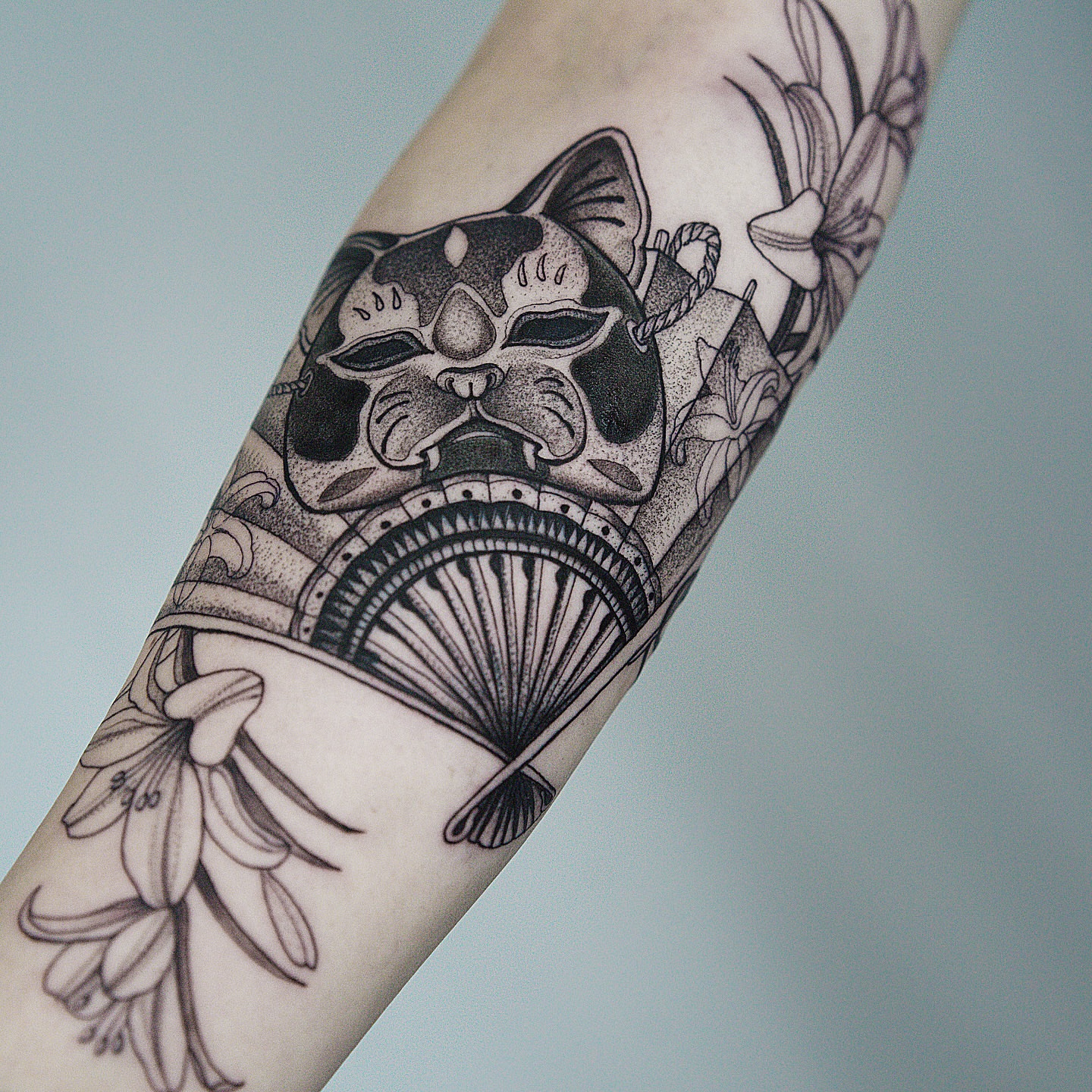 Cat mask dotwork tattoo on the forearm by H I R A  L U P E - tattoo artist, Oakland, California