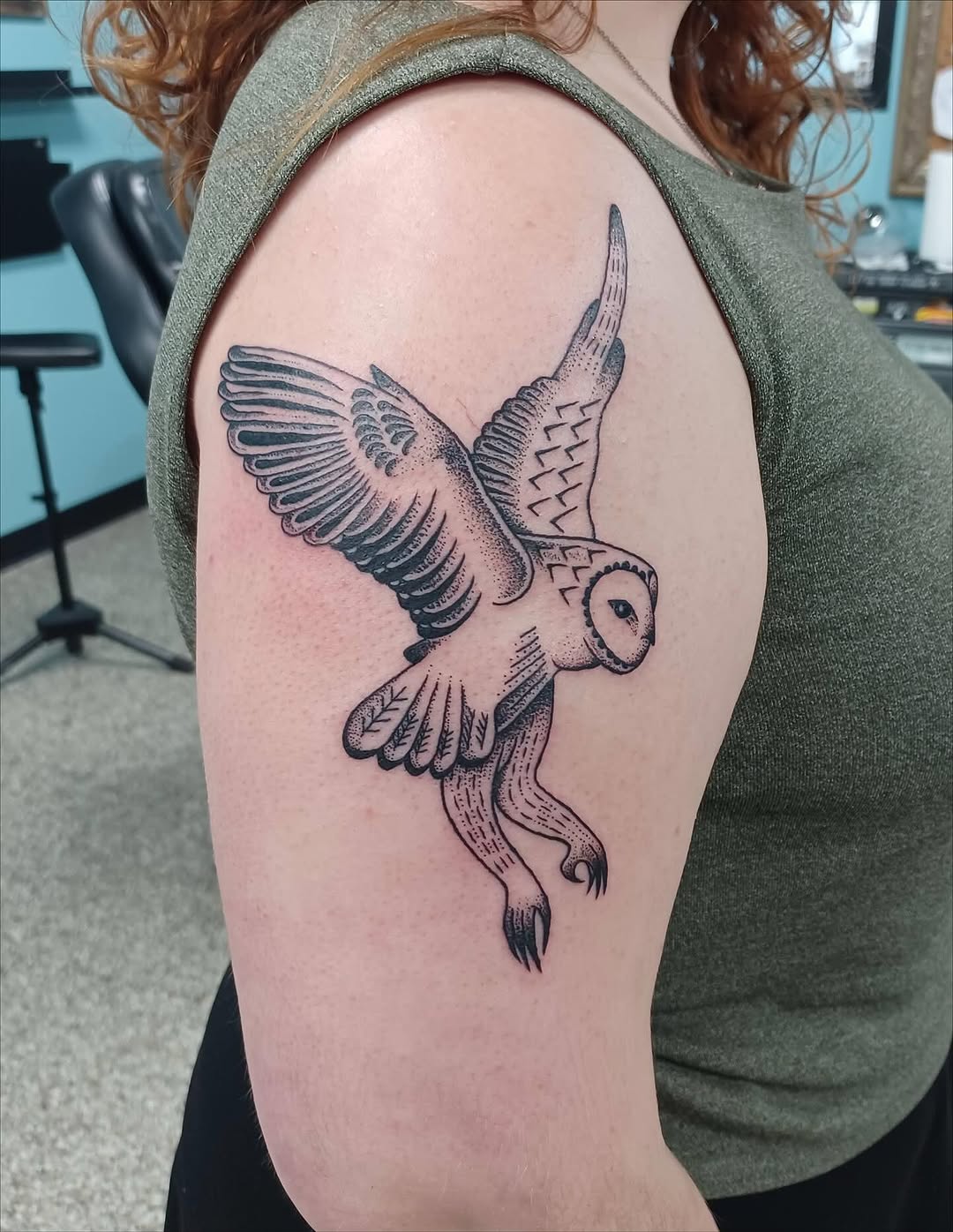 Owl in flight fine line tattoo on the shoulder by Abi