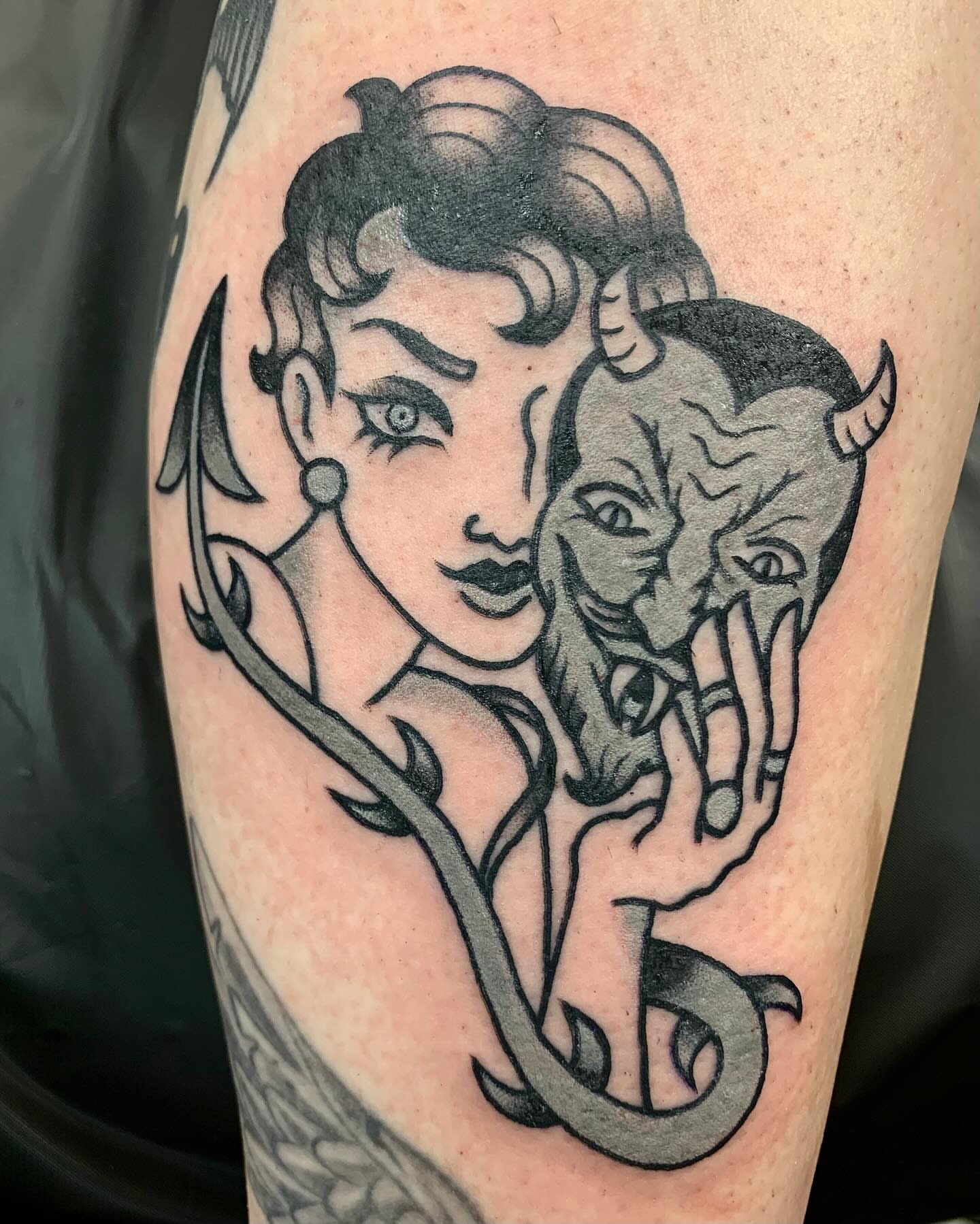 Woman with bull American traditional tattoo on the forearm by jay