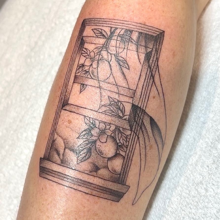 Fruit crate dotwork tattoo on the forearm by Molly Dixon