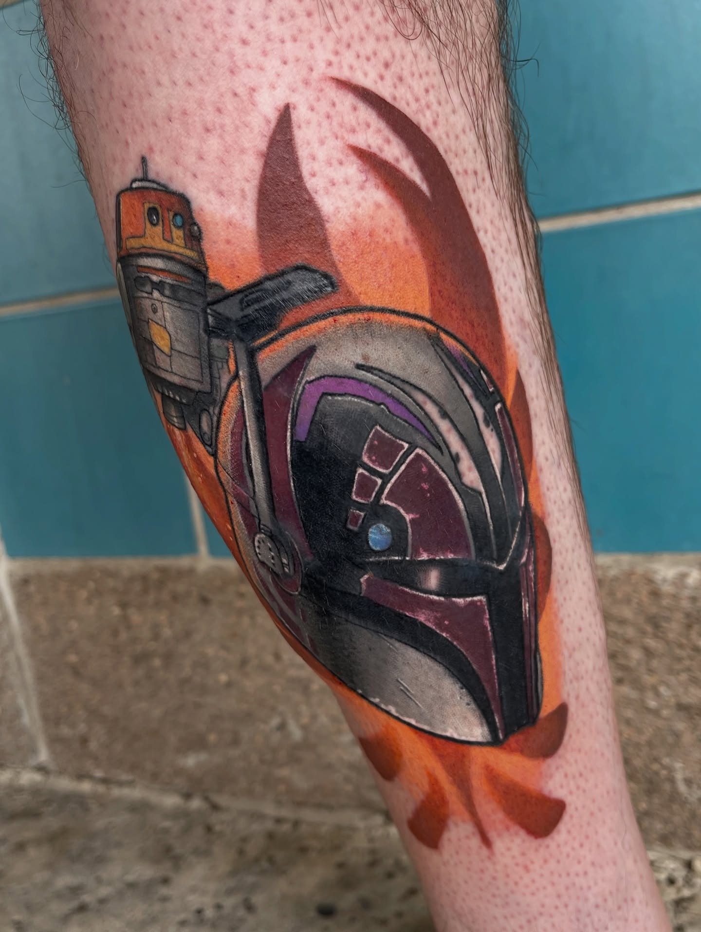 Mandalorian helmet realism tattoo on the forearm by Chris Sparks, I just go by Sparks.