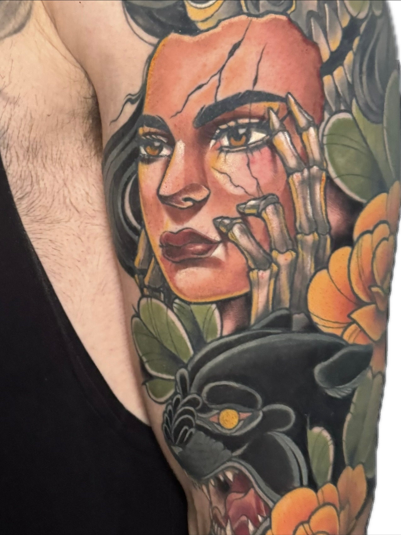 Woman's face American traditional tattoo on the upper arm by Bri