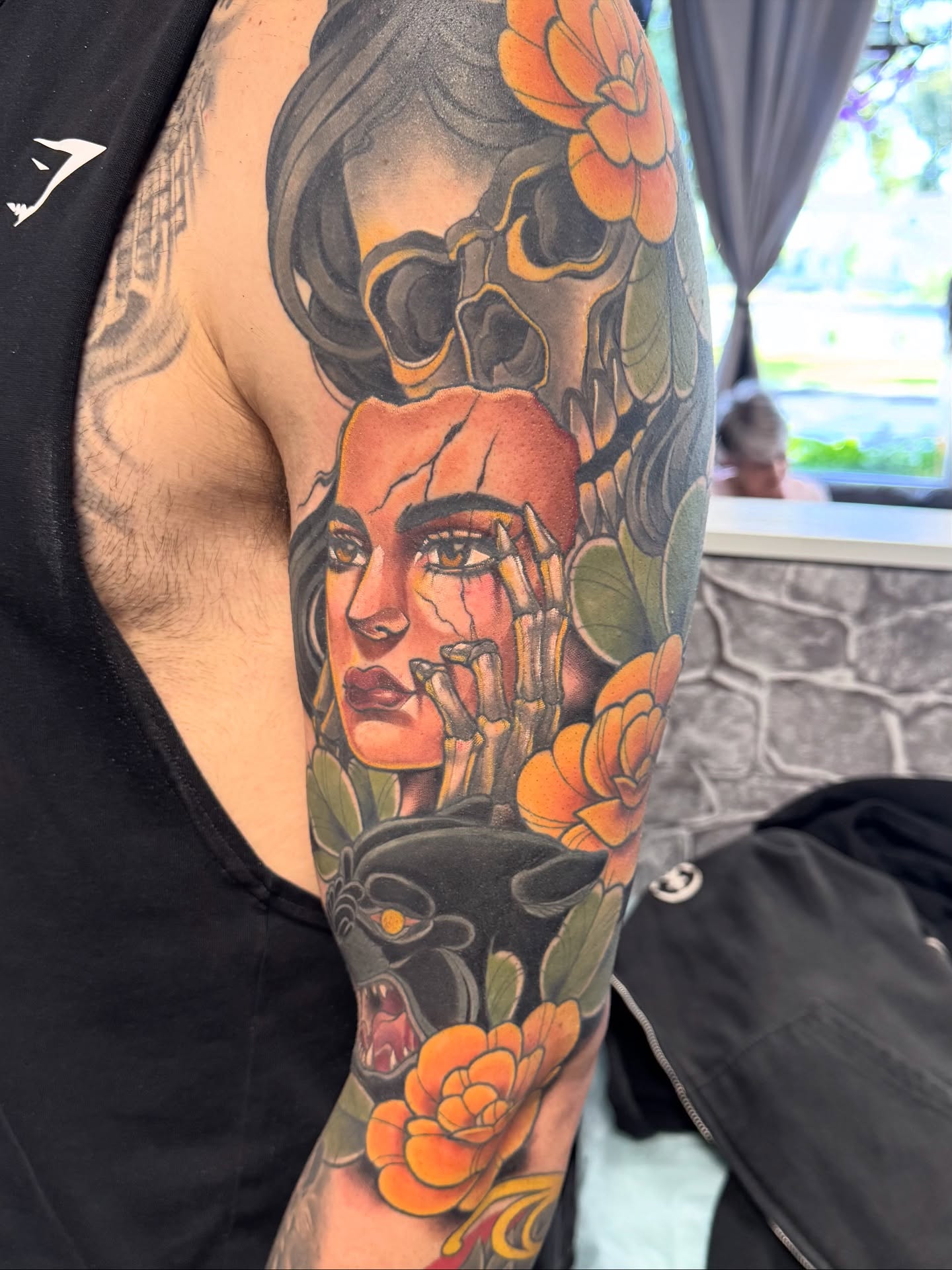 Woman with flowers realism tattoo on the forearm by Bri