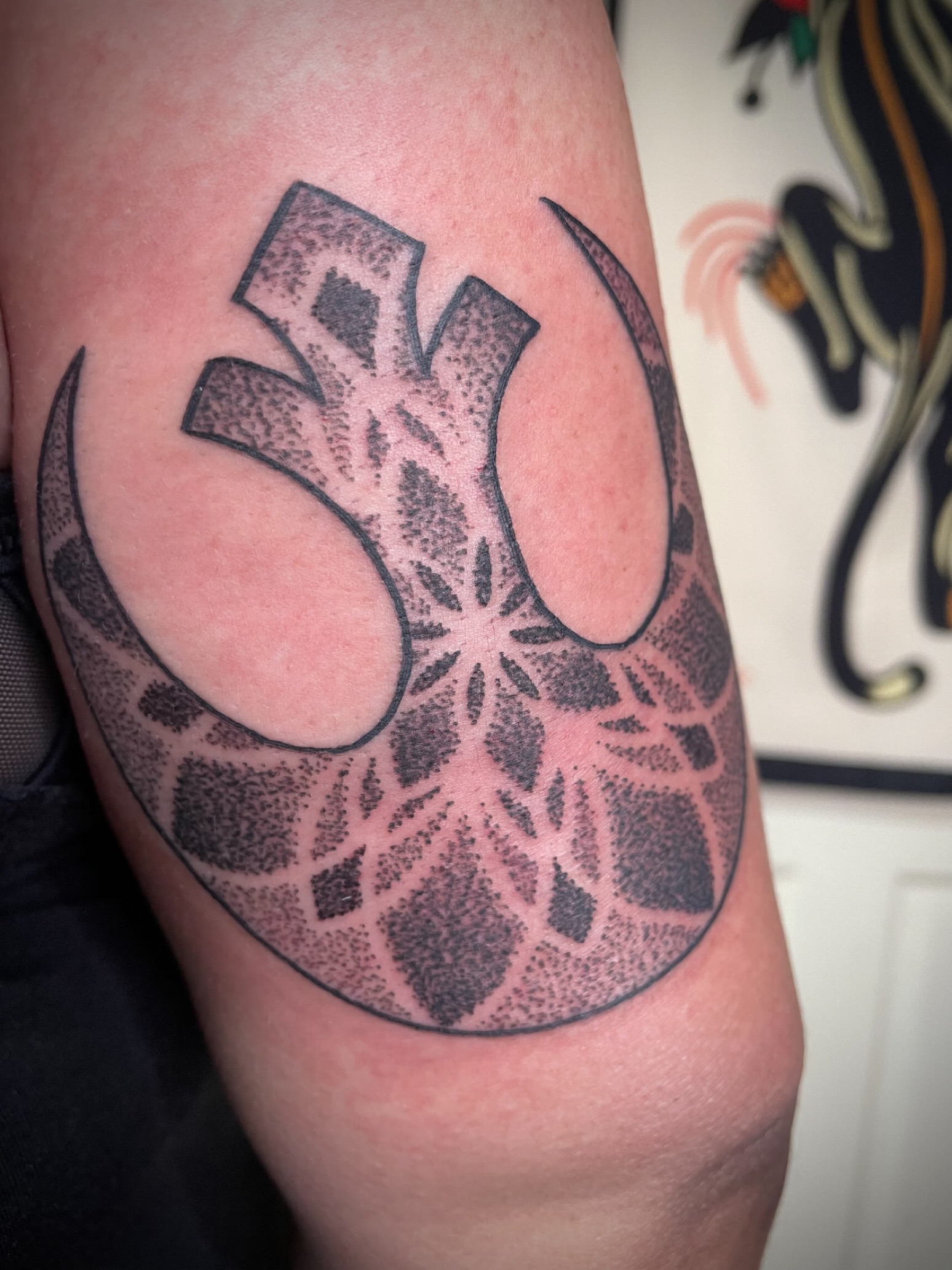 Rebel alliance symbol dotwork tattoo on the forearm by San Diego Tattoo Artist