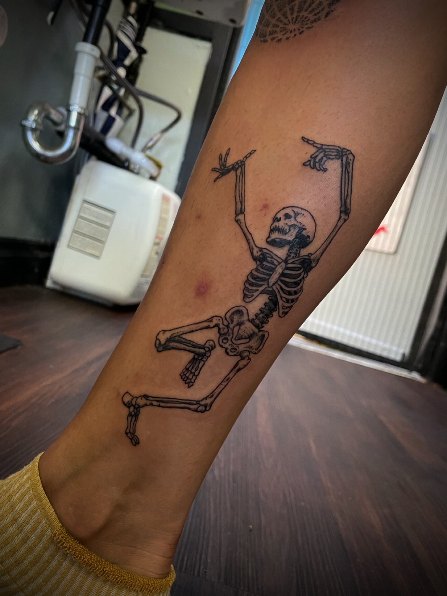 Skeleton black and grey tattoo on the forearm by San Diego Tattoo Artist