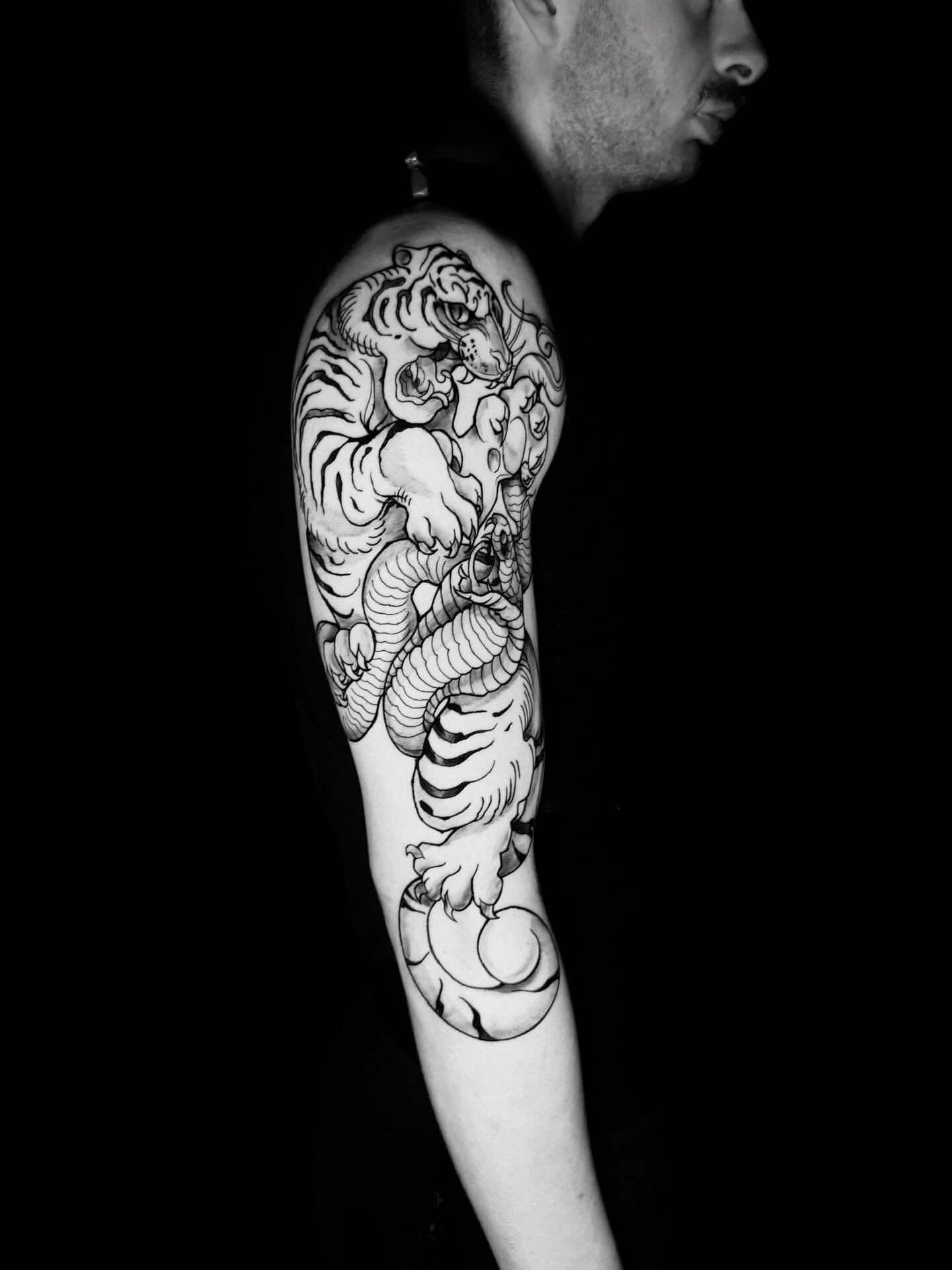 Tattoo by @skunk_punk_ink — japanese_irezumi, black_and_grey
