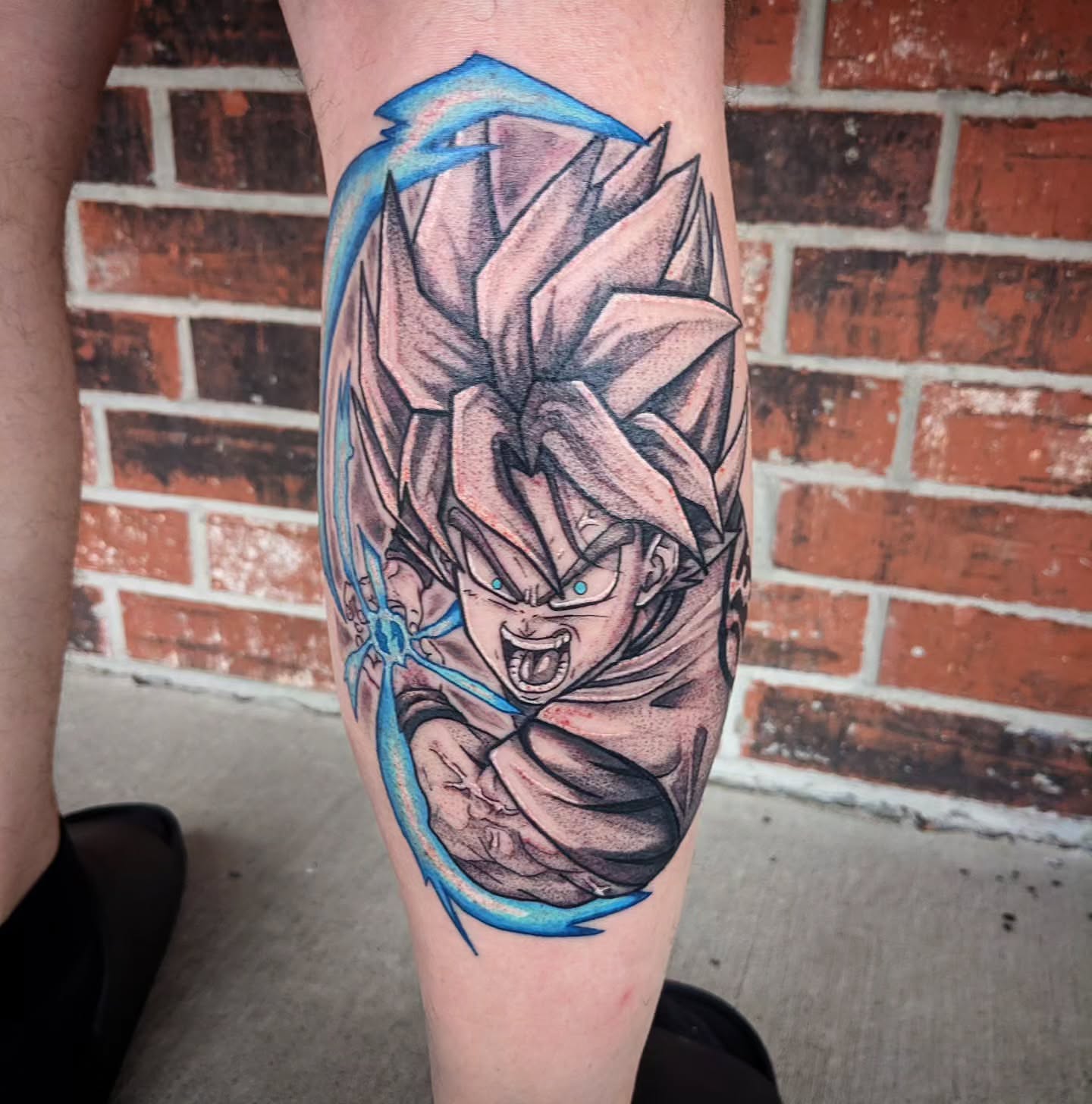 Son goku realism tattoo on the forearm by 𝕸𝖆𝖉𝖎 (𝕸𝖆𝖉 𝕯𝖔𝖌)
