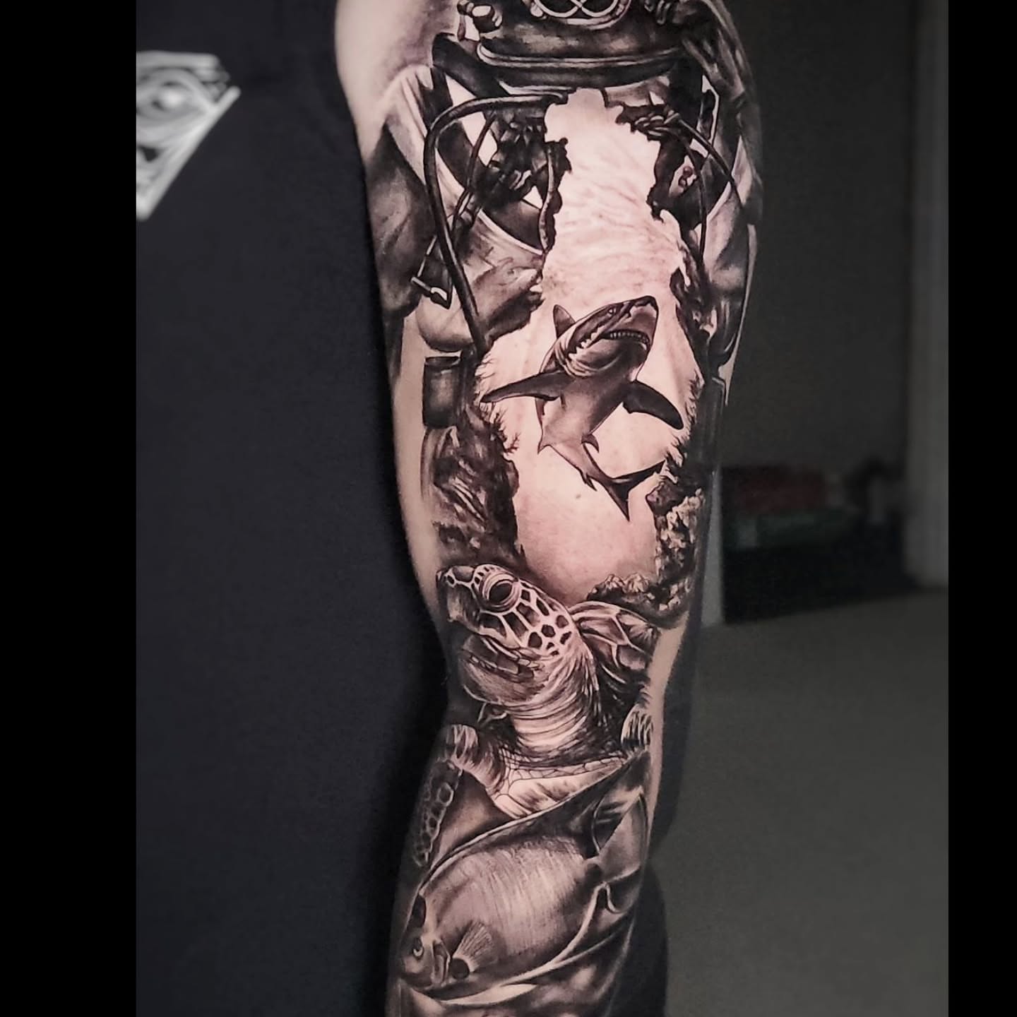 Underwater scene realism tattoo on the forearm by Elidia Veliz