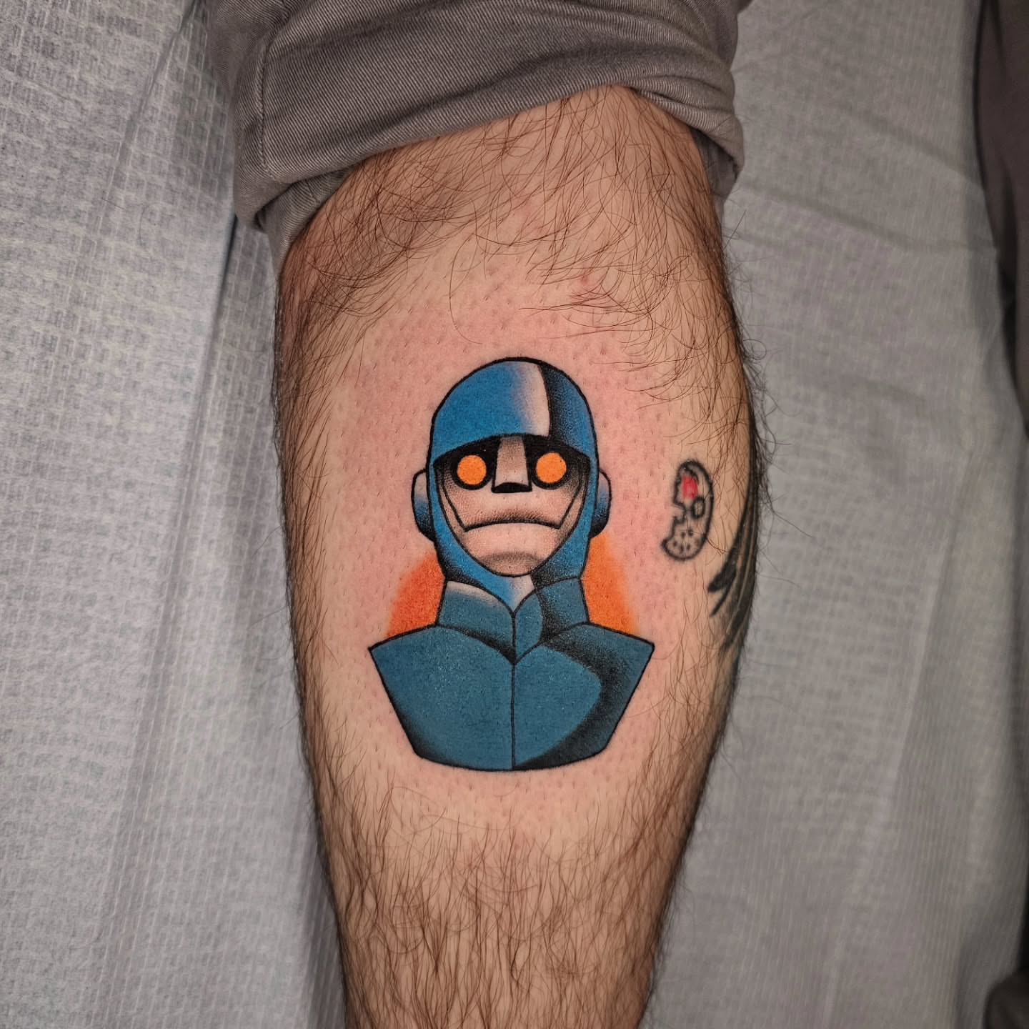 Robot American traditional tattoo on the thigh by Nathan Thomas