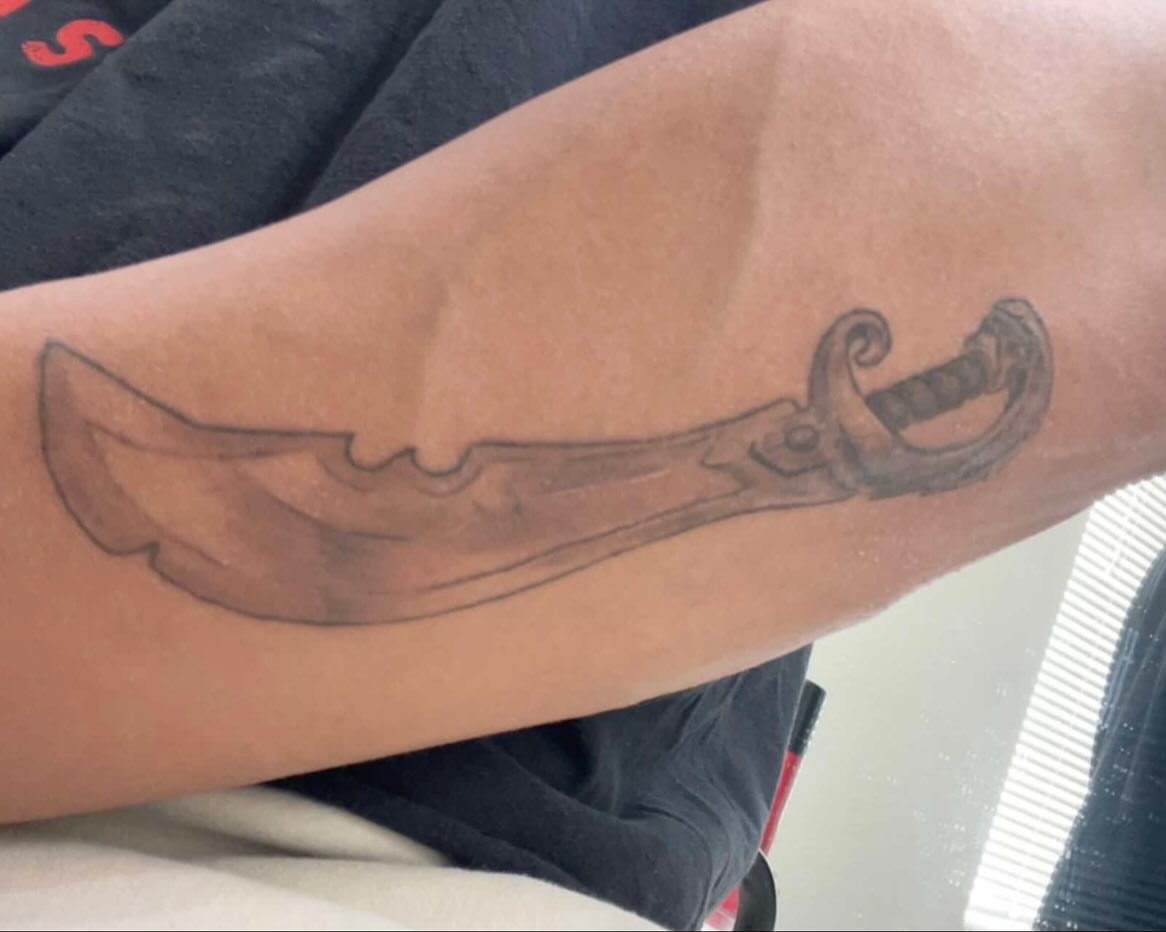 Sword black and grey tattoo on the forearm by Kevin, Las Vegas, Nevada